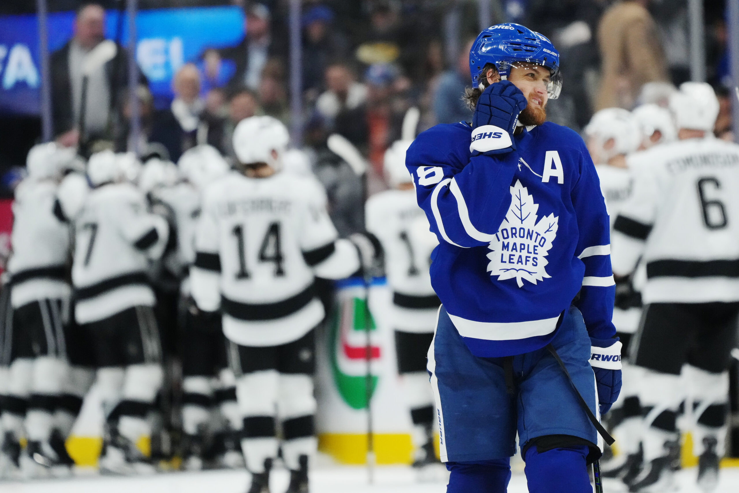 The Toronto Maple Leafs’ William Nylander, foreground, reacts as the...