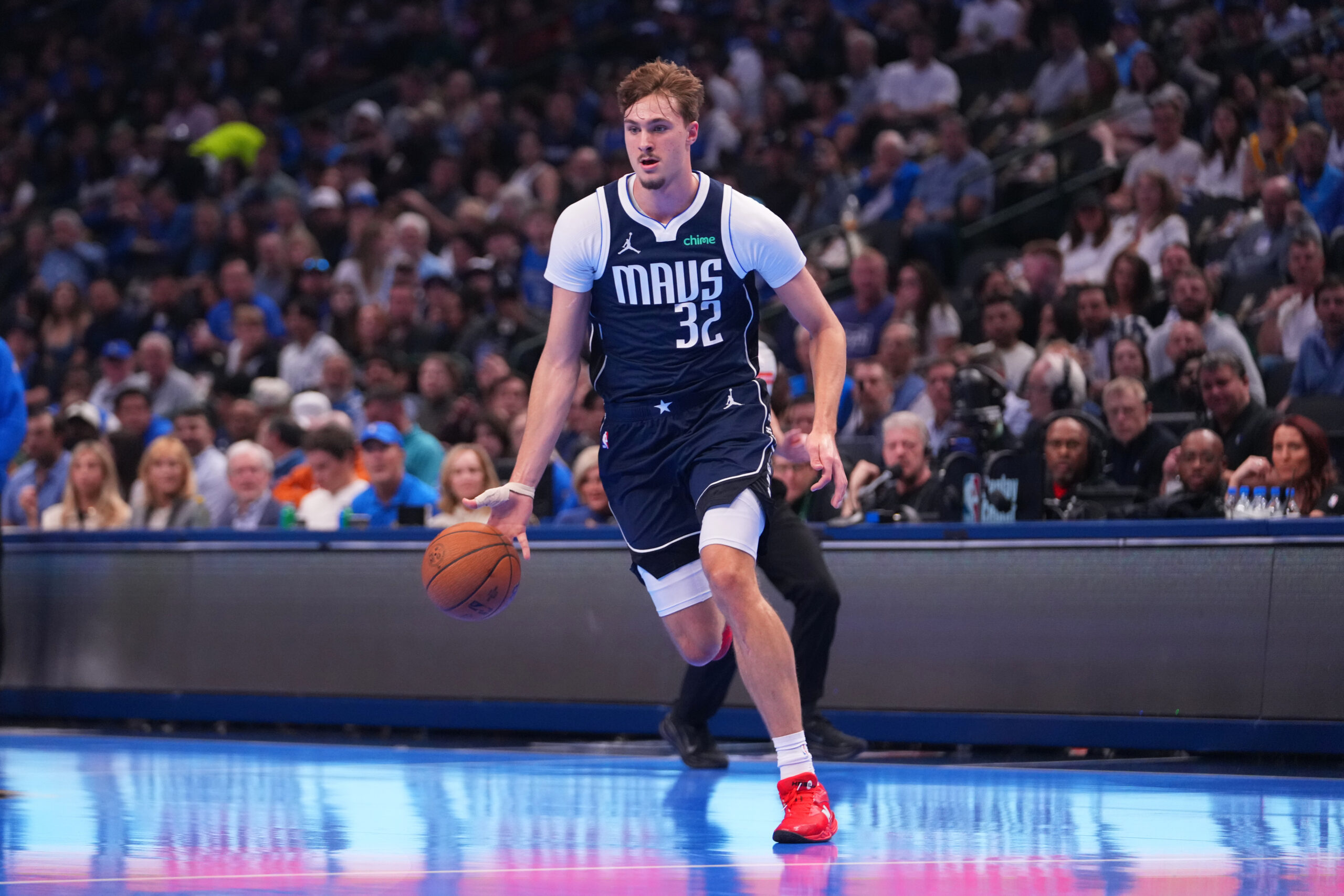 Dallas Mavericks forward Cooper Flagg drives to the basket against...
