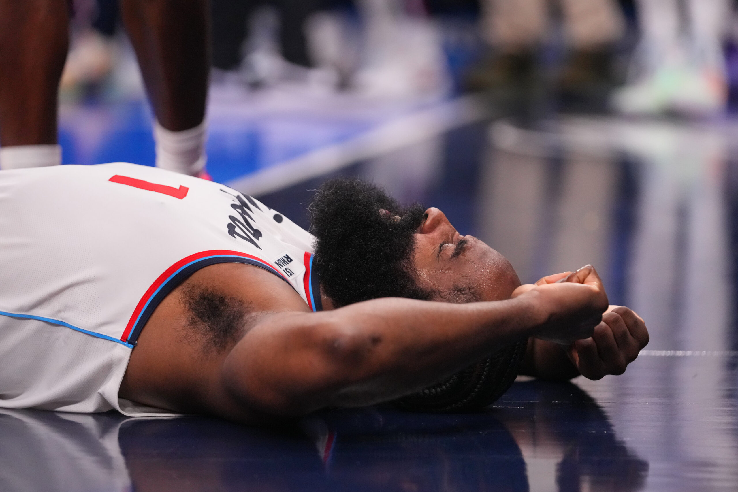 Clippers guard James Harden reacts after a play against the...