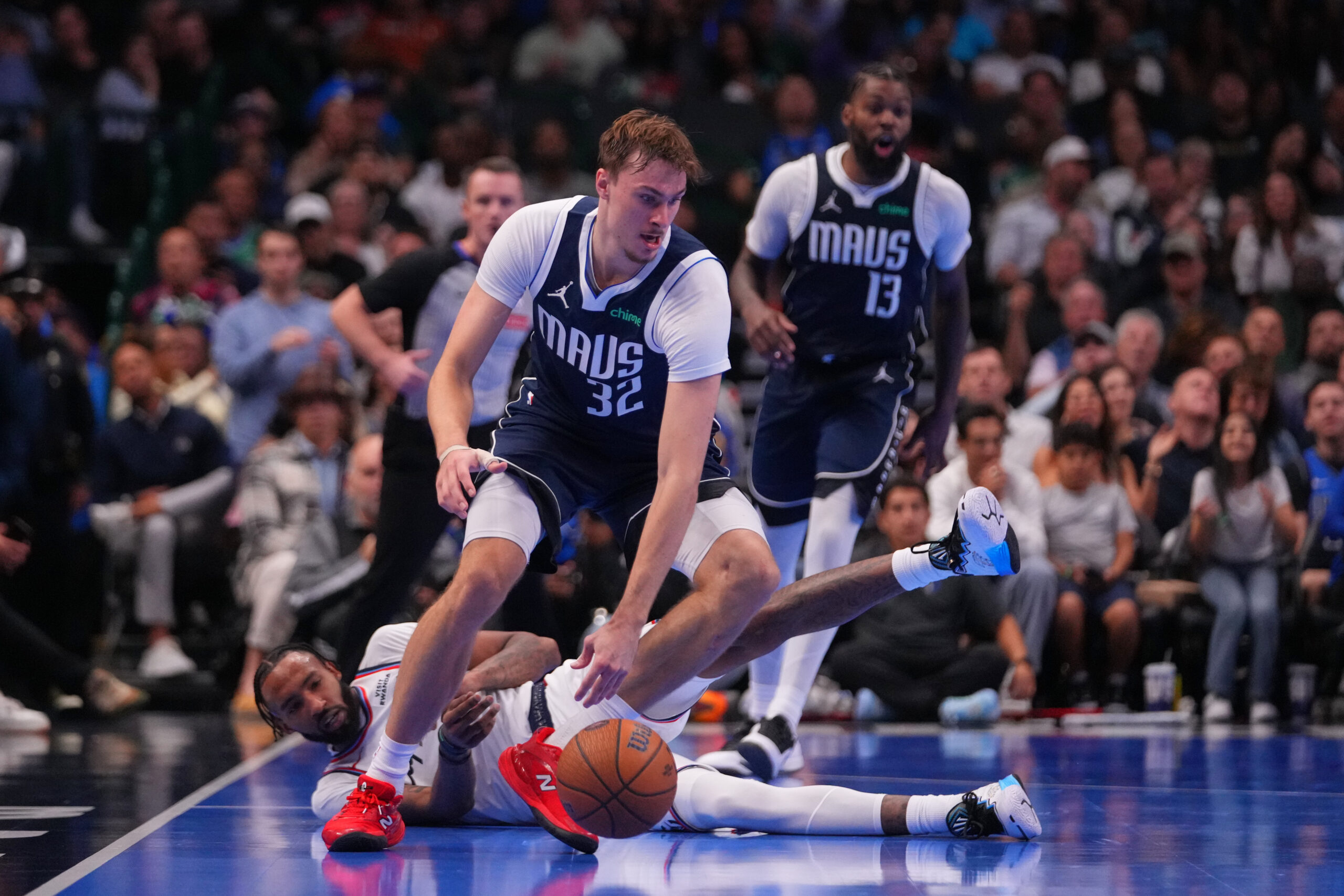 Dallas Mavericks forward Cooper Flagg (32) controls the ball as...