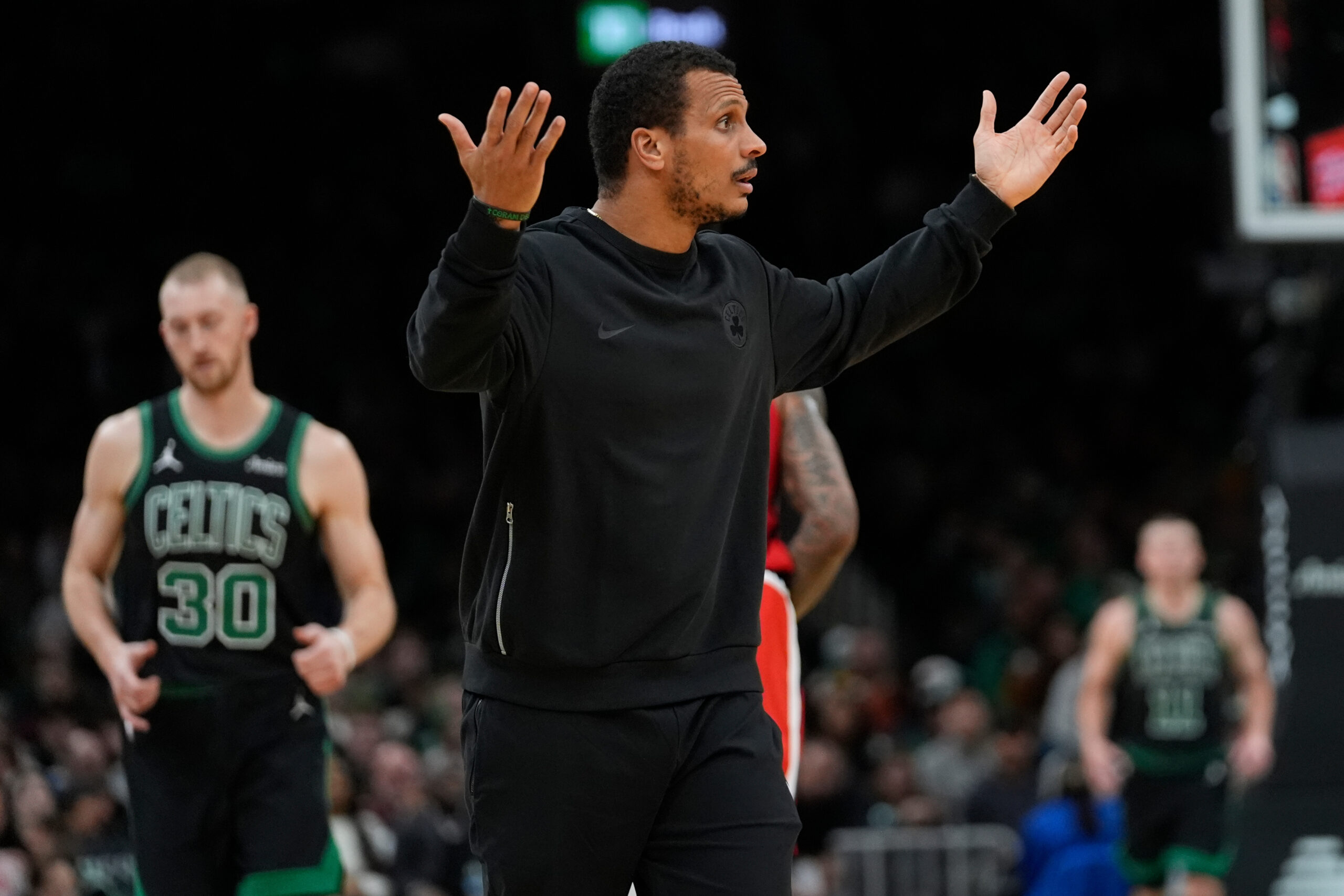 Boston Celtics head coach Joe Mazzulla reacts during the second...