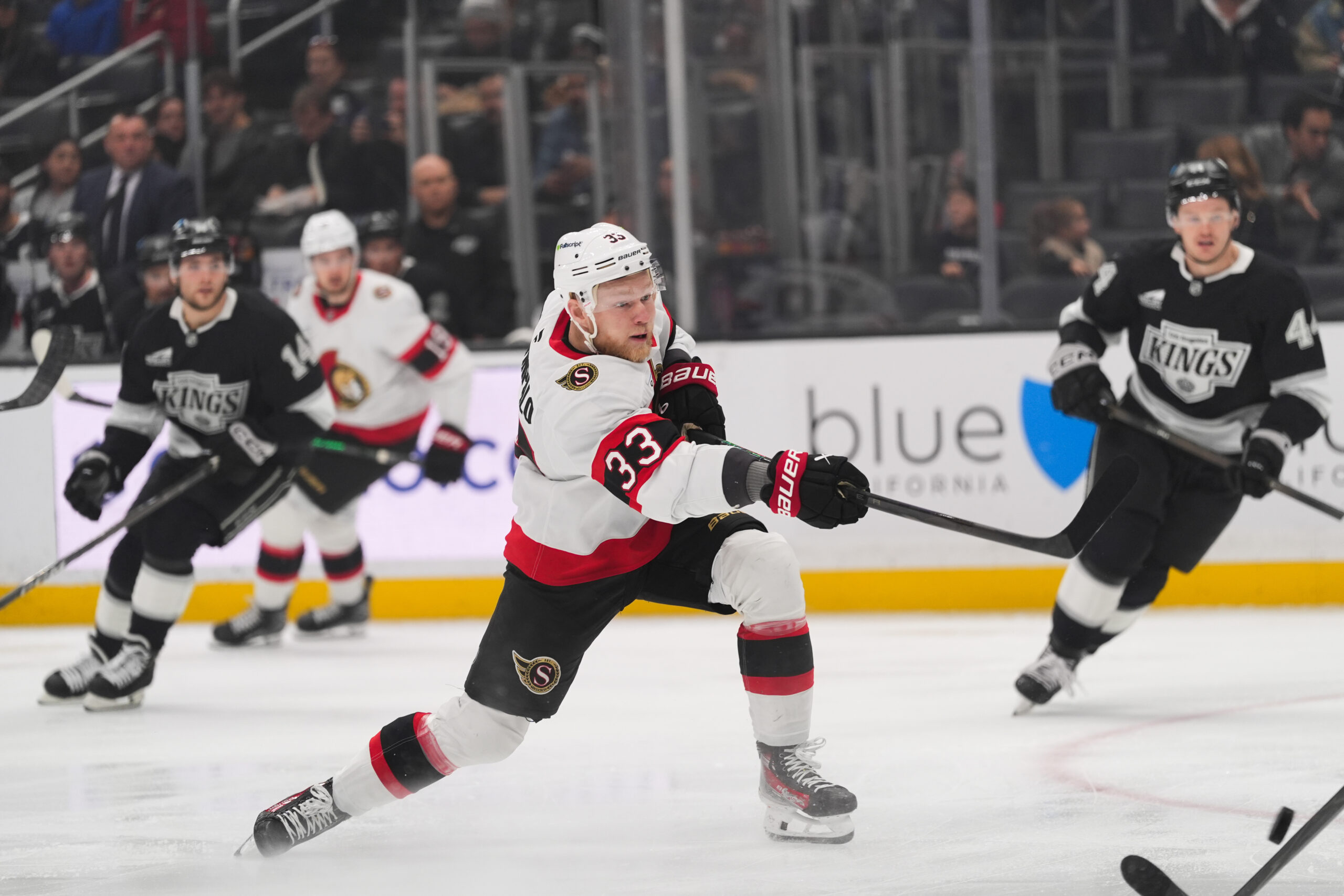 Ottawa Senators defenseman Nikolas Matinpalo attempts a shot during the...