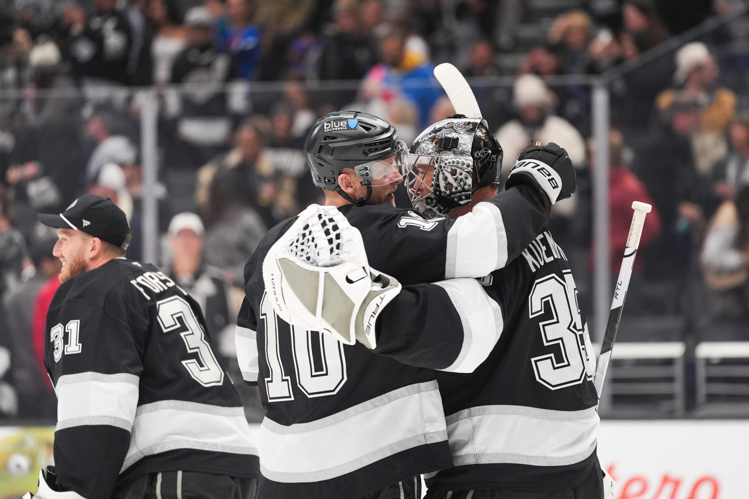 Kings right wing Corey Perry (10) and goaltender Darcy Kuemper,...