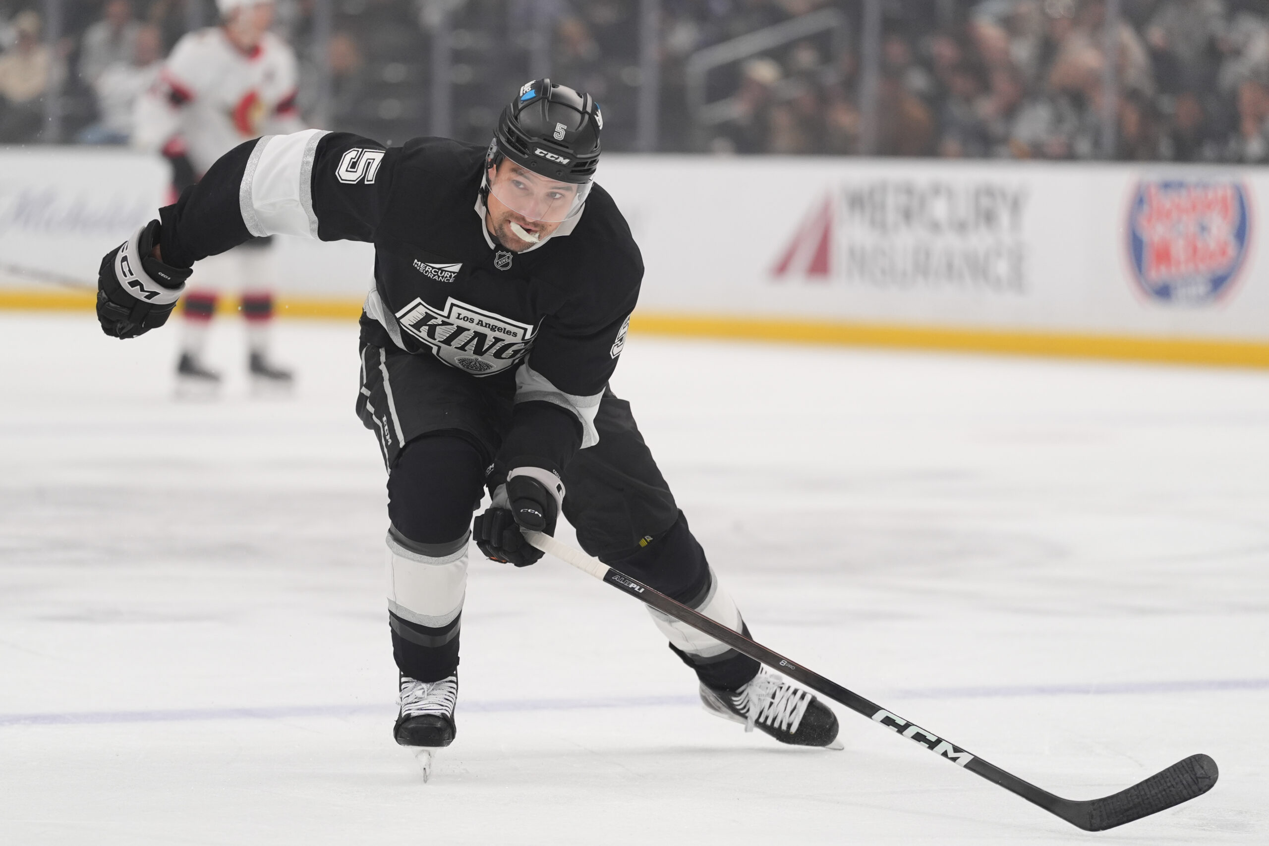 Kings defenseman Cody Ceci skates during the first period of...