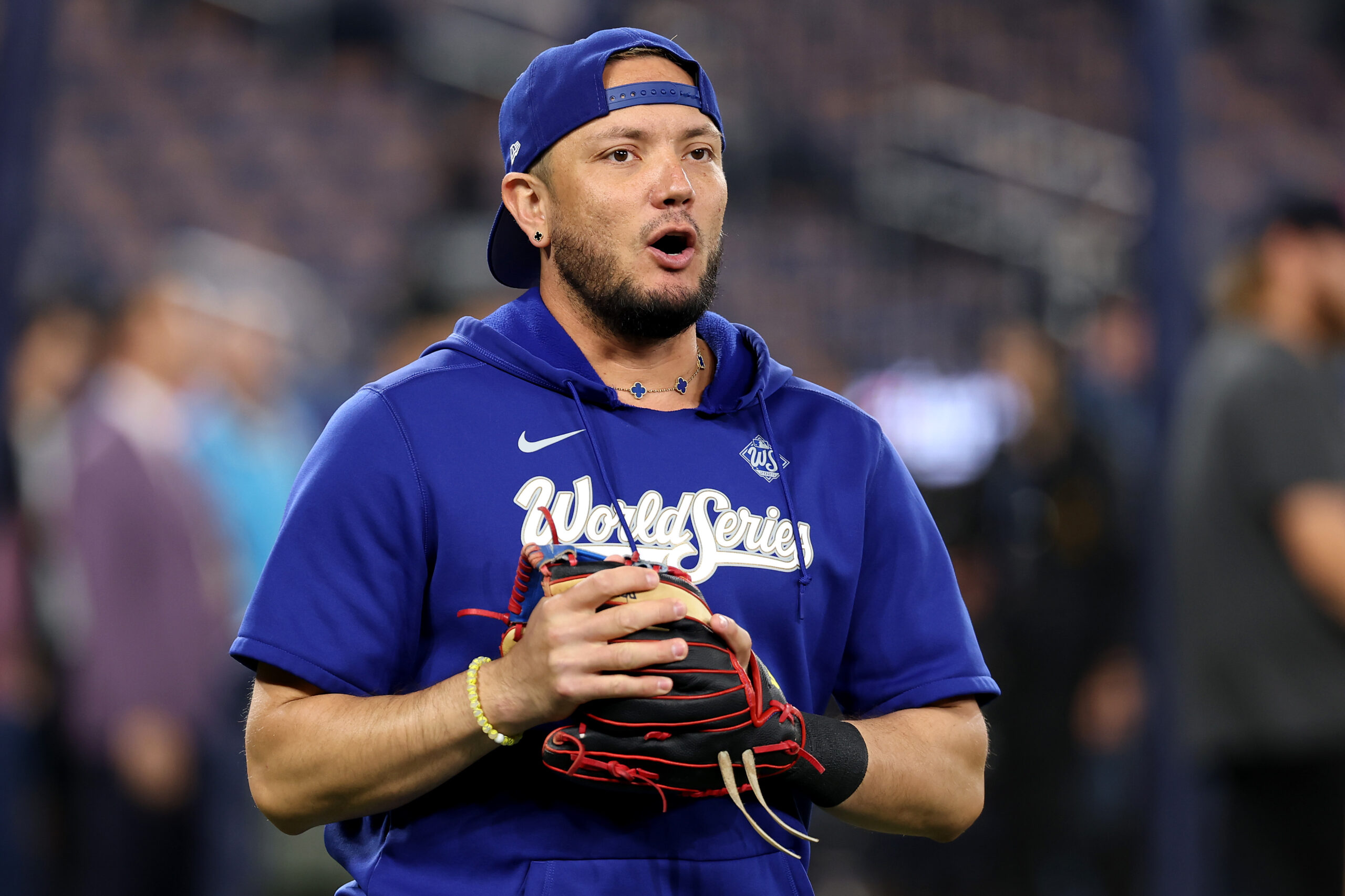 Dodgers infielder Miguel Rojas warms up before Game 7 of...