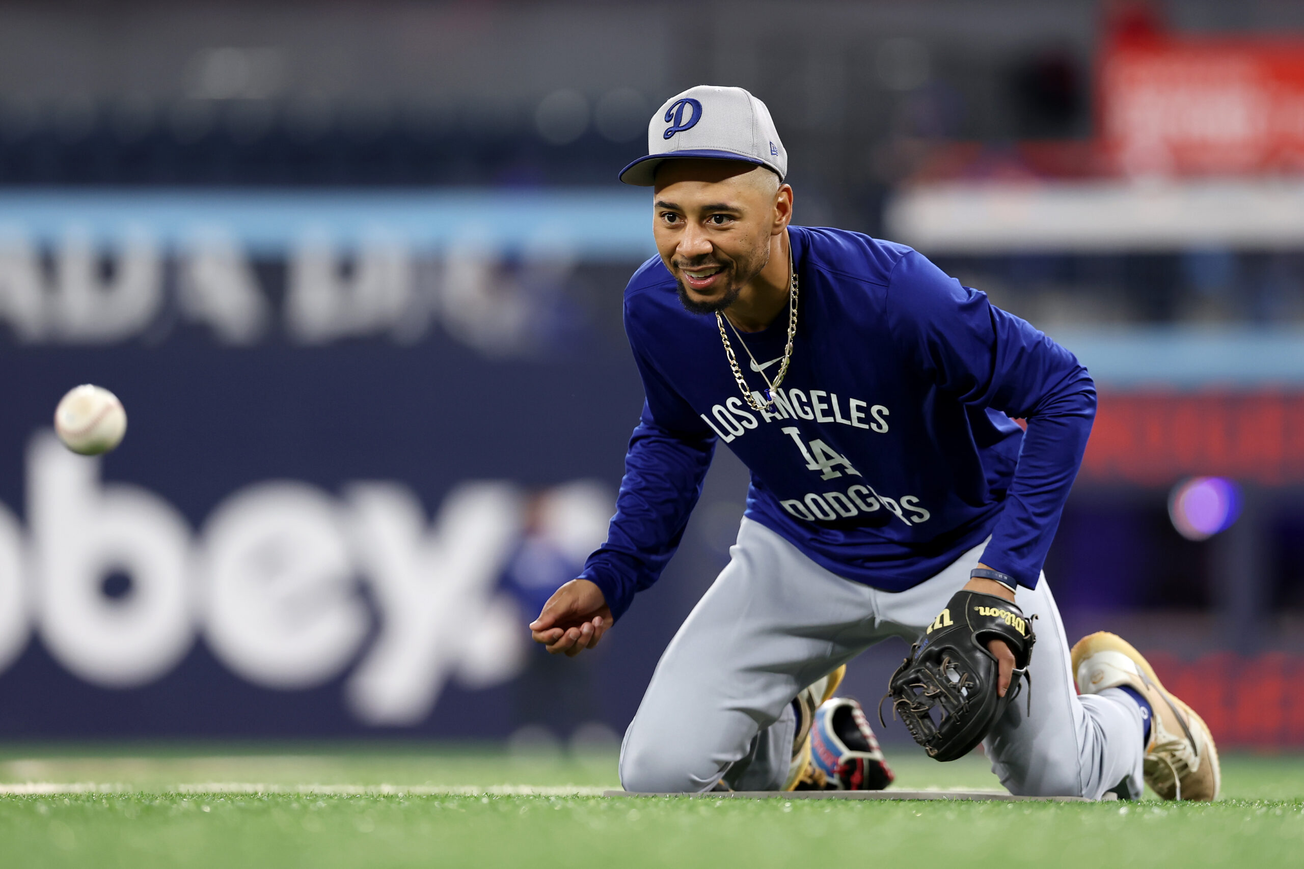 Dodgers shortstop Mookie Betts warms up before Game 7 of...