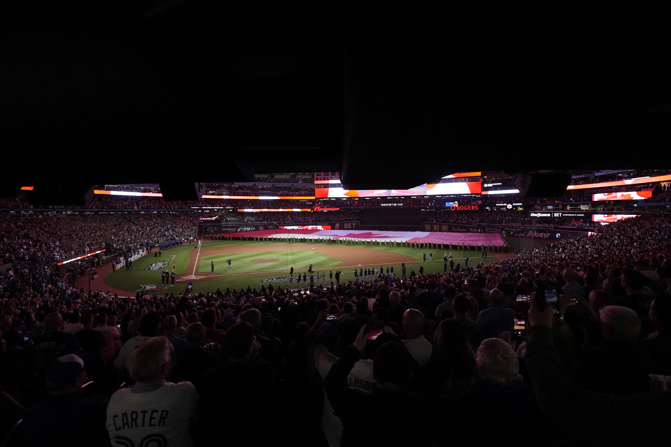 A view of the Canadian flag on the field during...