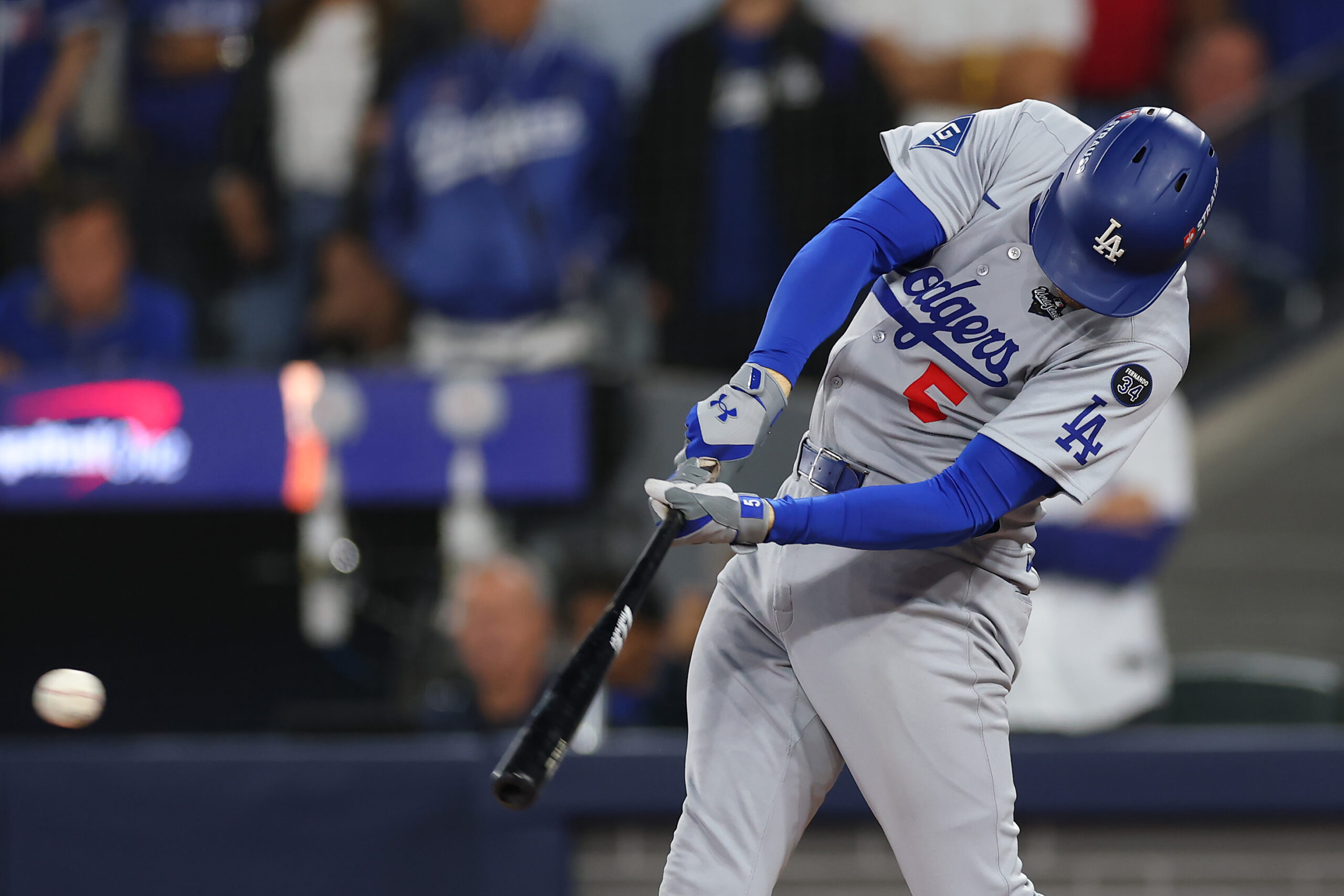The Dodgers’ Freddie Freeman hits a single against the Toronto...