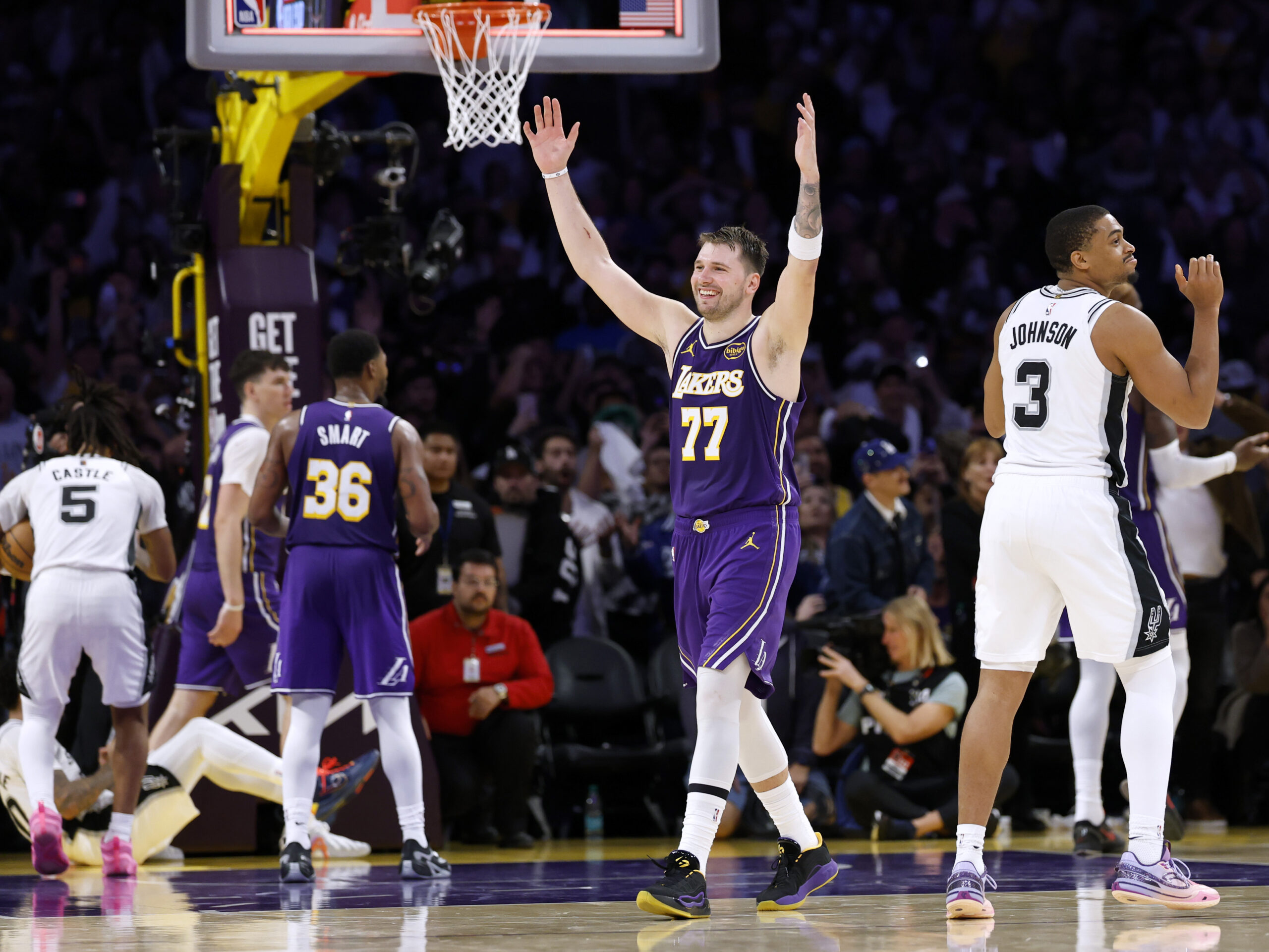 Lakers star Luka Doncic reacts behind the San Antonio Spurs’...
