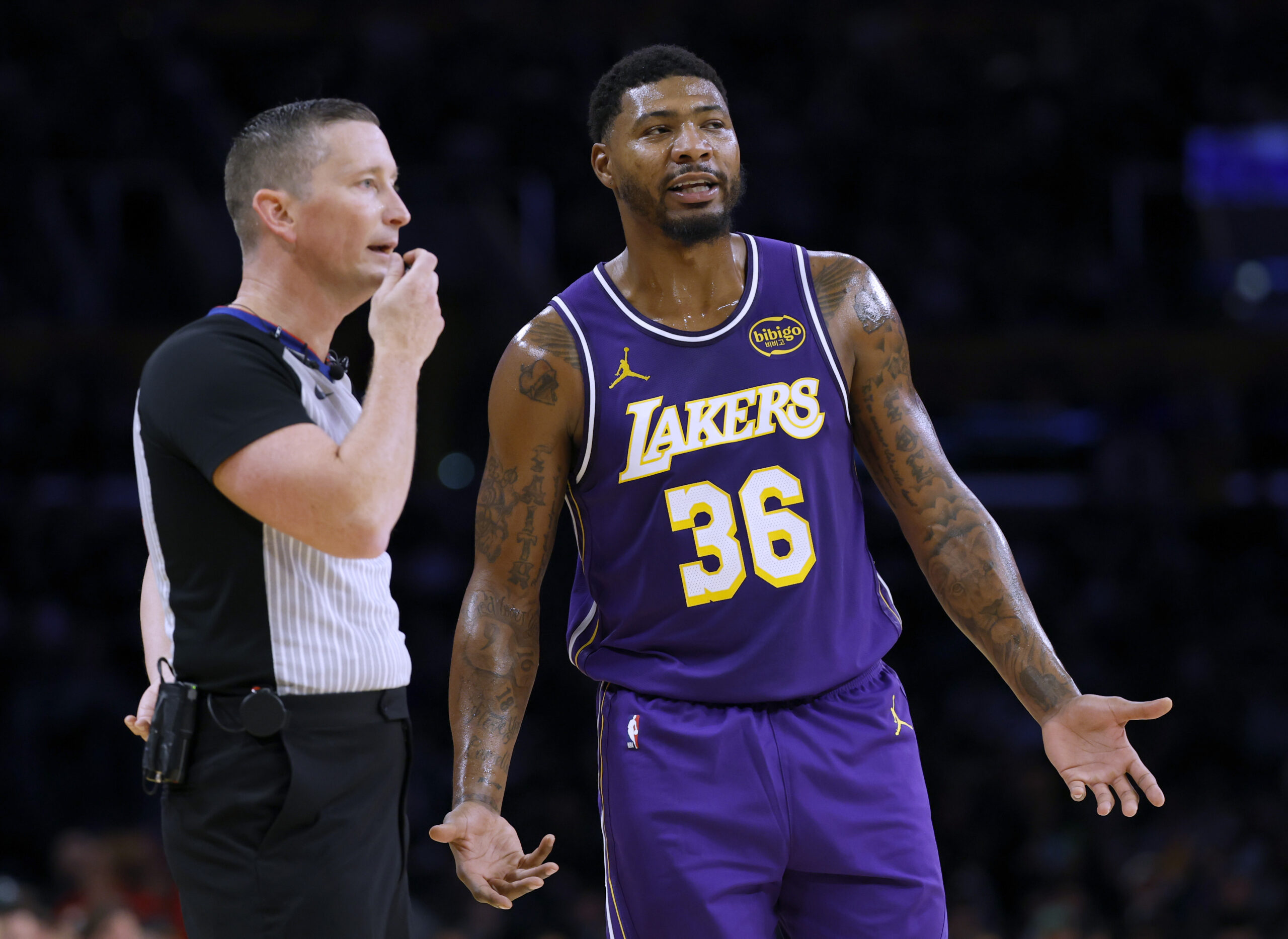 Lakers guard Marcus Smart pleads his case to referee Nick...
