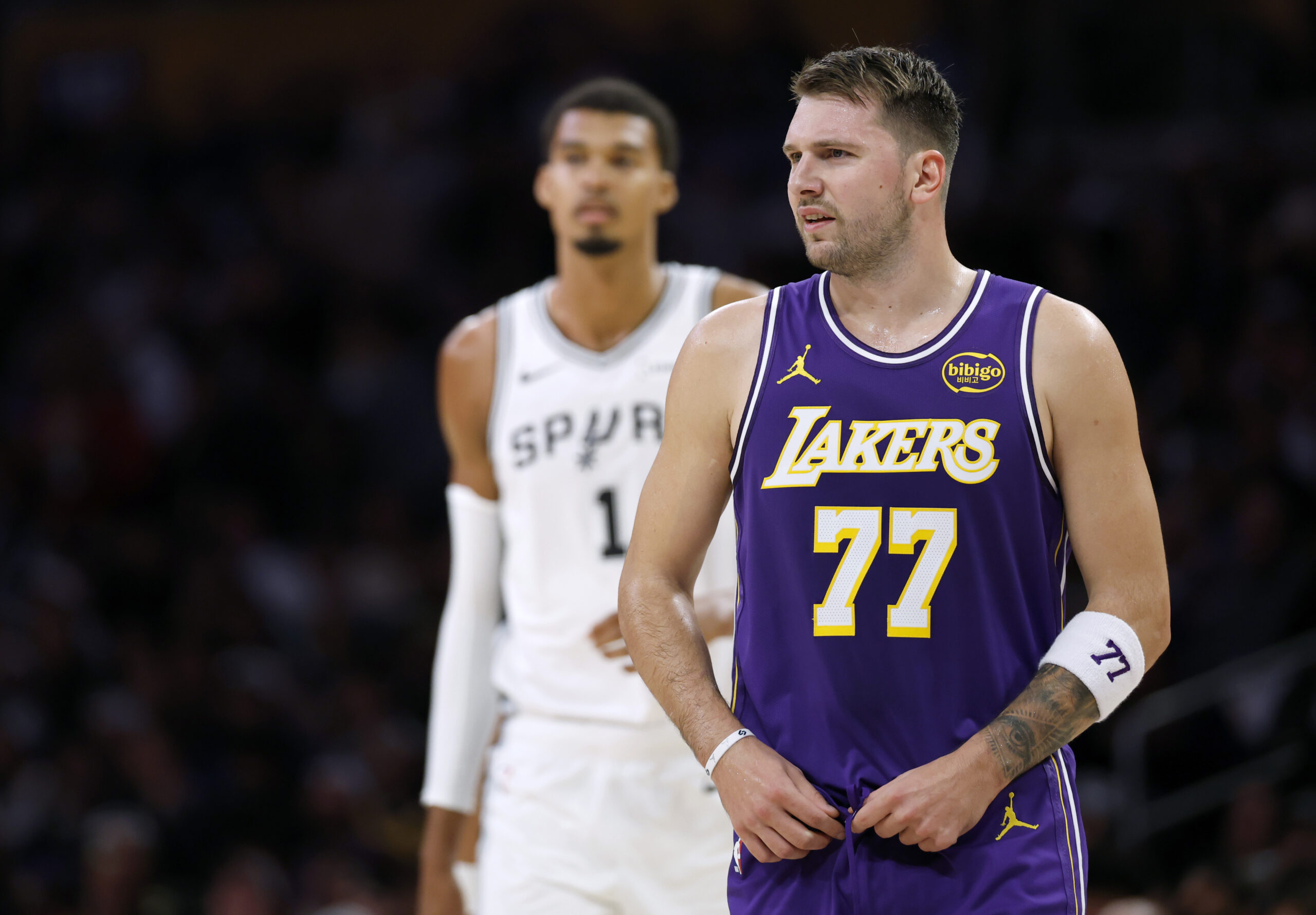 Lakers star Luka Doncic reacts in front of San Antonio...