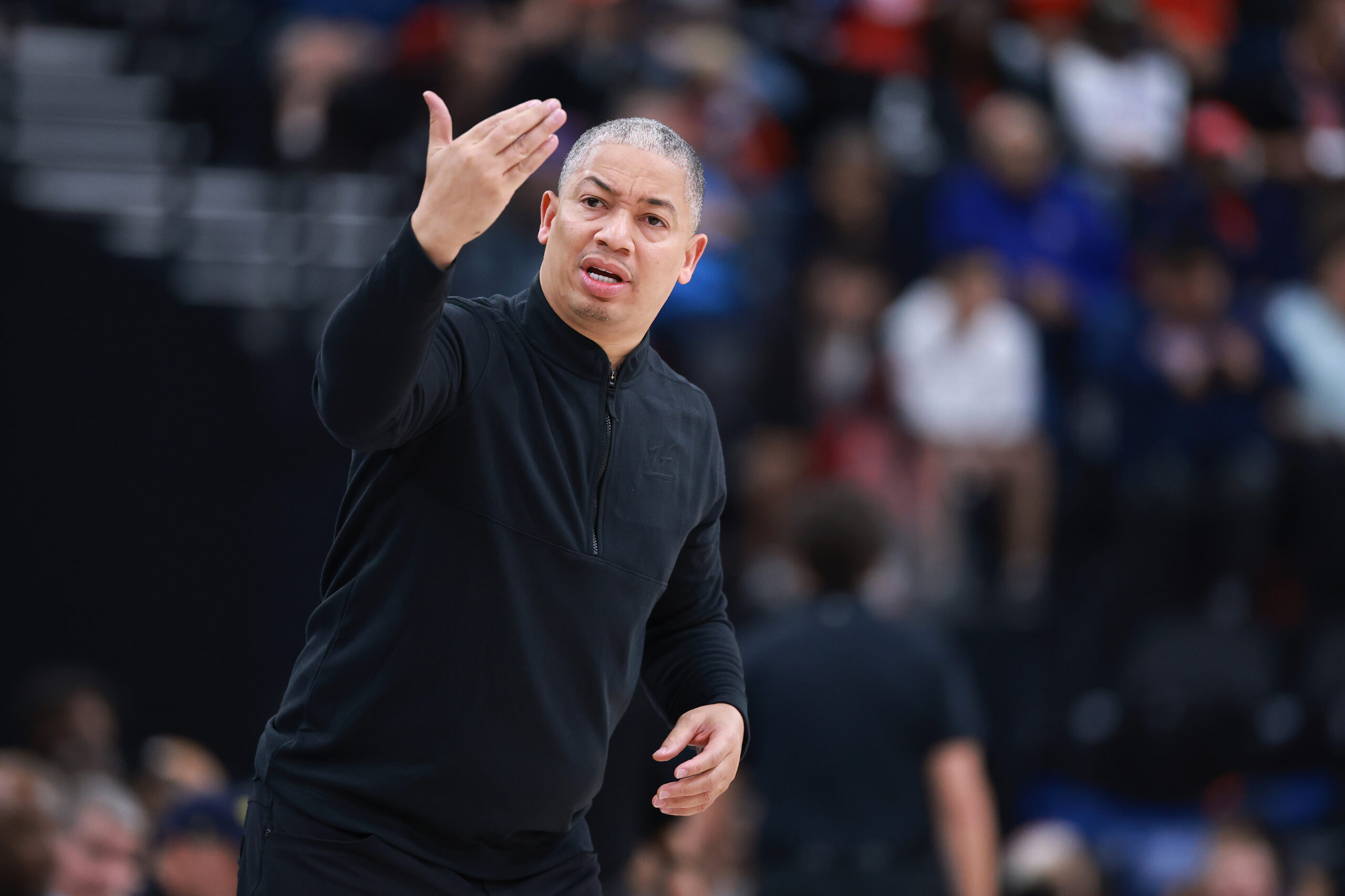 Clippers head coach Tyronn Lue calls a play from the...