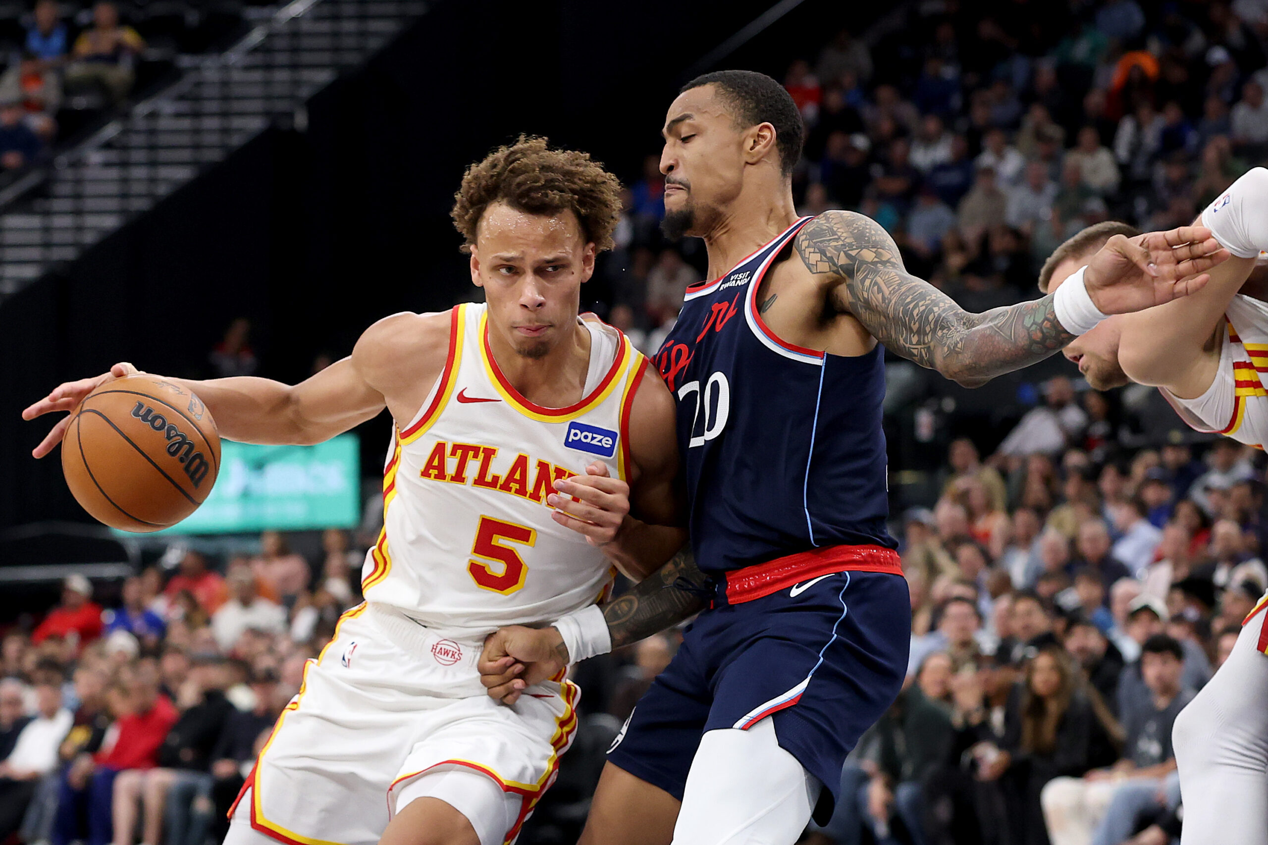 The Atlanta Hawks’ Dyson Daniels drives to the basket as...