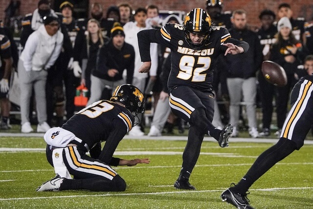 Nov 18, 2023; Columbia, Missouri, USA; Missouri Tigers place kicker Harrison Mevis (92) kicks the winning field goal against the Florida Gators during the second half at Faurot Field at Memorial Stadium. Mandatory Credit: Denny Medley-USA TODAY Sports Harrison Mevis, Rams