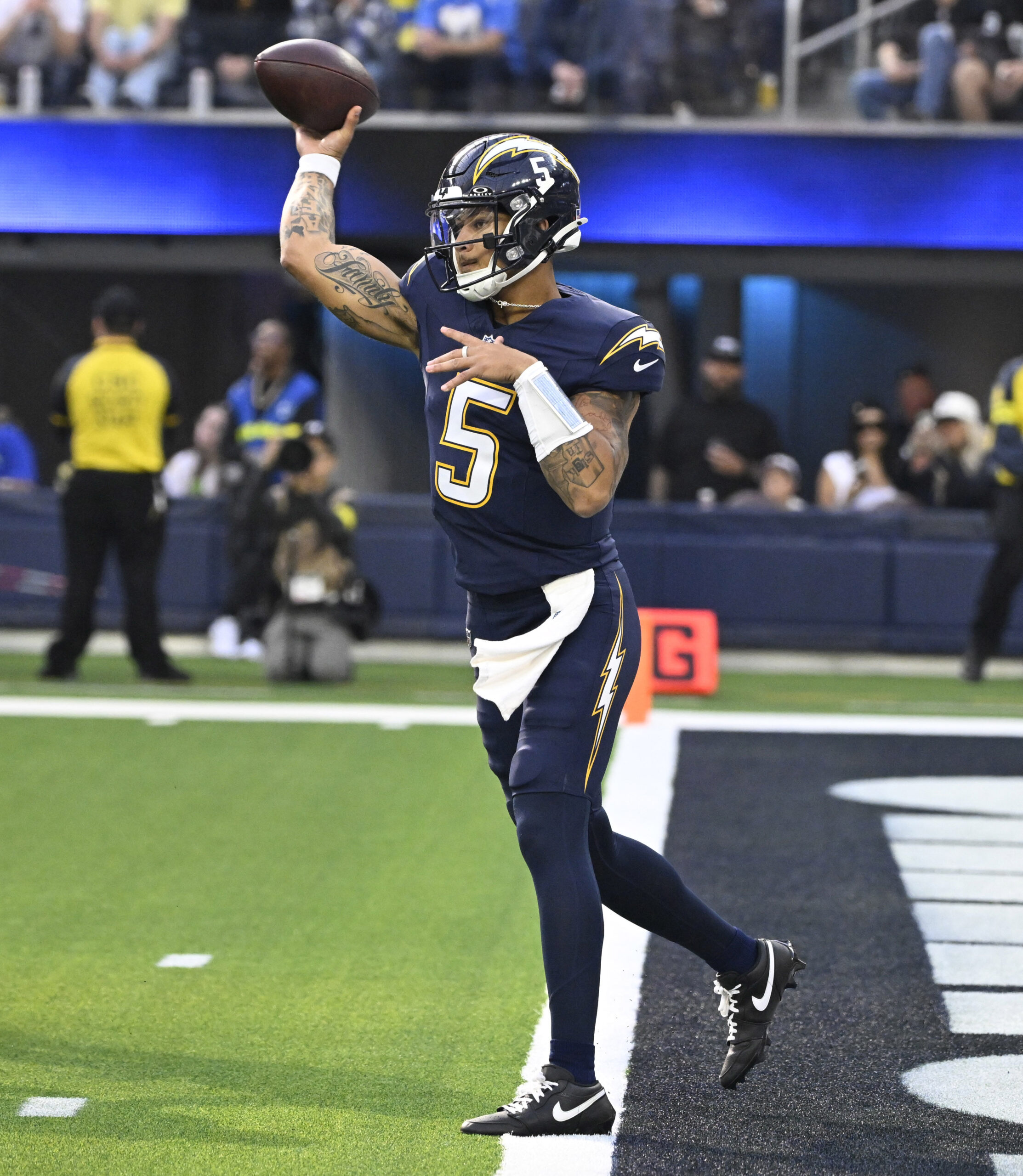 Quarterback Trey Lance #5 of the Los Angeles Chargers passes...