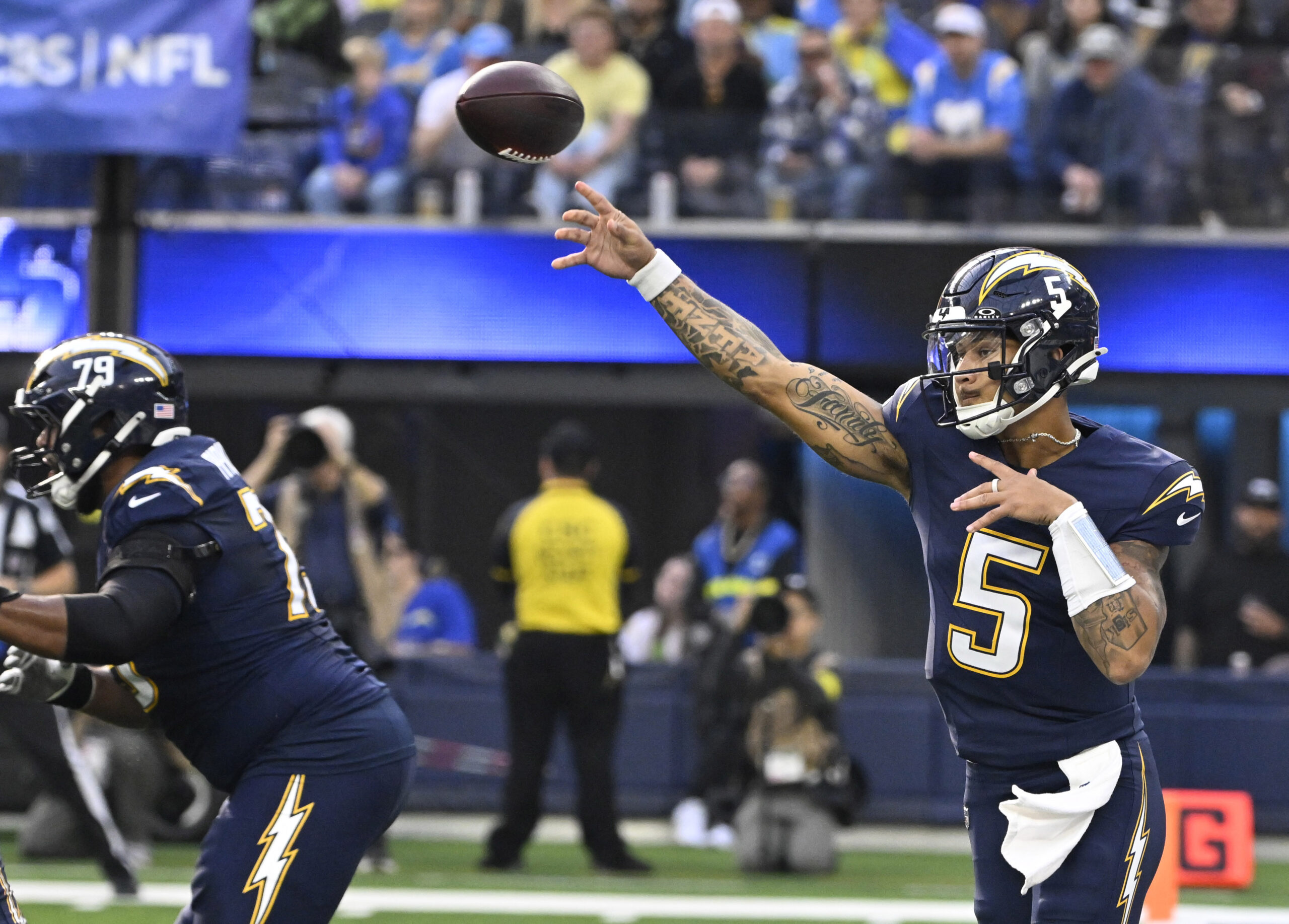 Quarterback Trey Lance #5 of the Los Angeles Chargers passes...