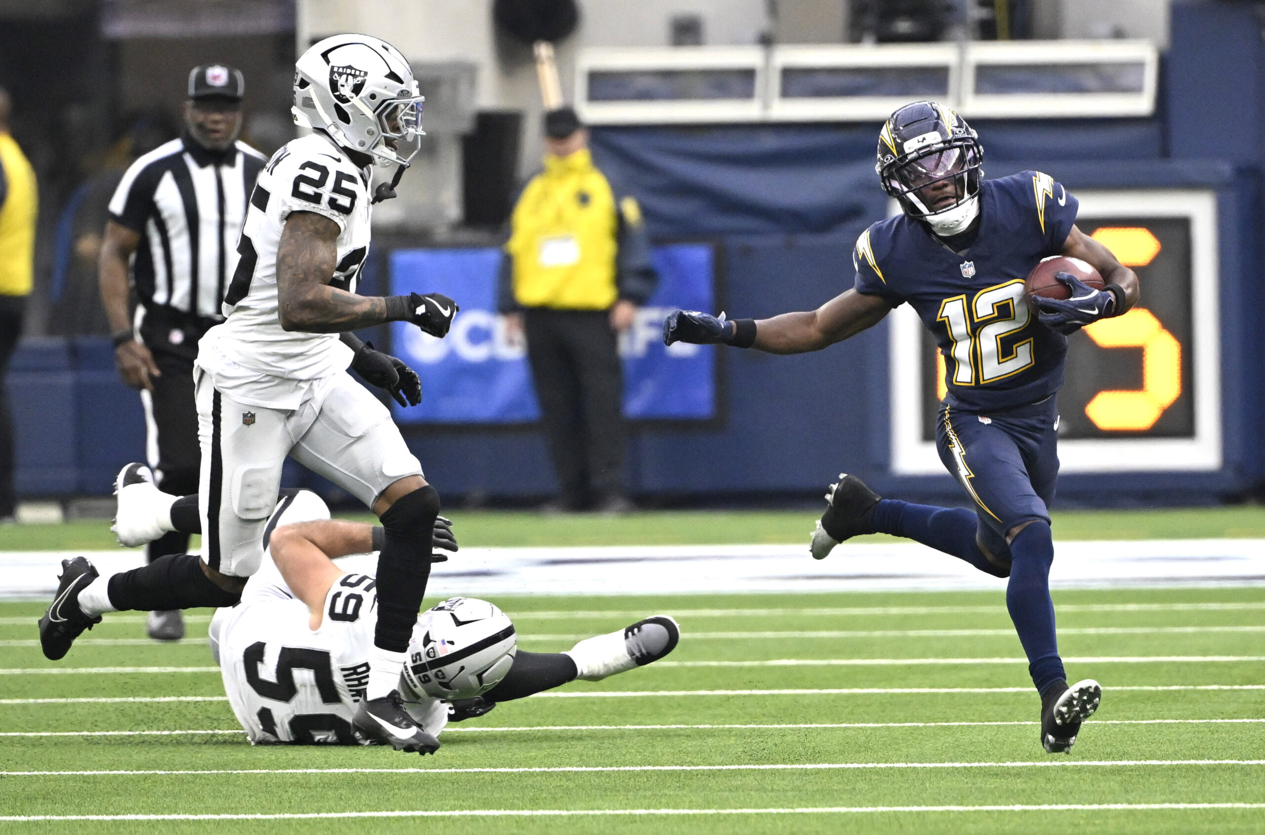 Wide receiver Derius Davis #12 of the Los Angeles Chargers...