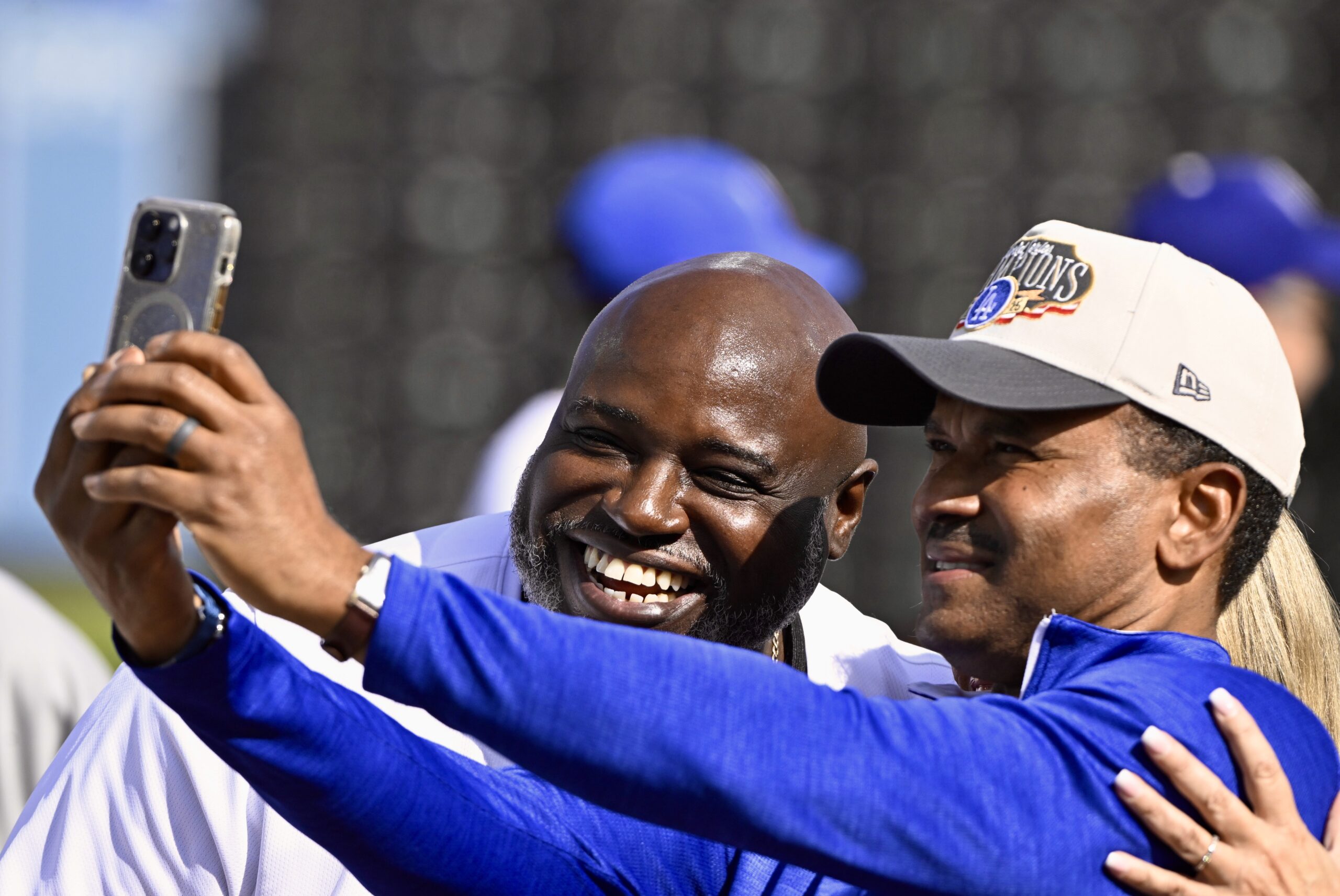 Performer Keith Williams Jr. ,left, poses with Jose Mota during...
