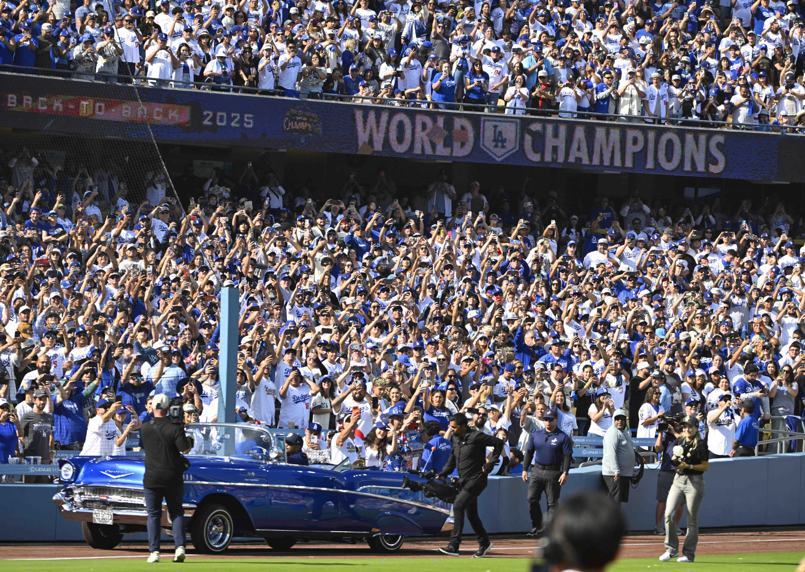 Ice Cube with the 2025 Commisioners Trophy during a celebration...