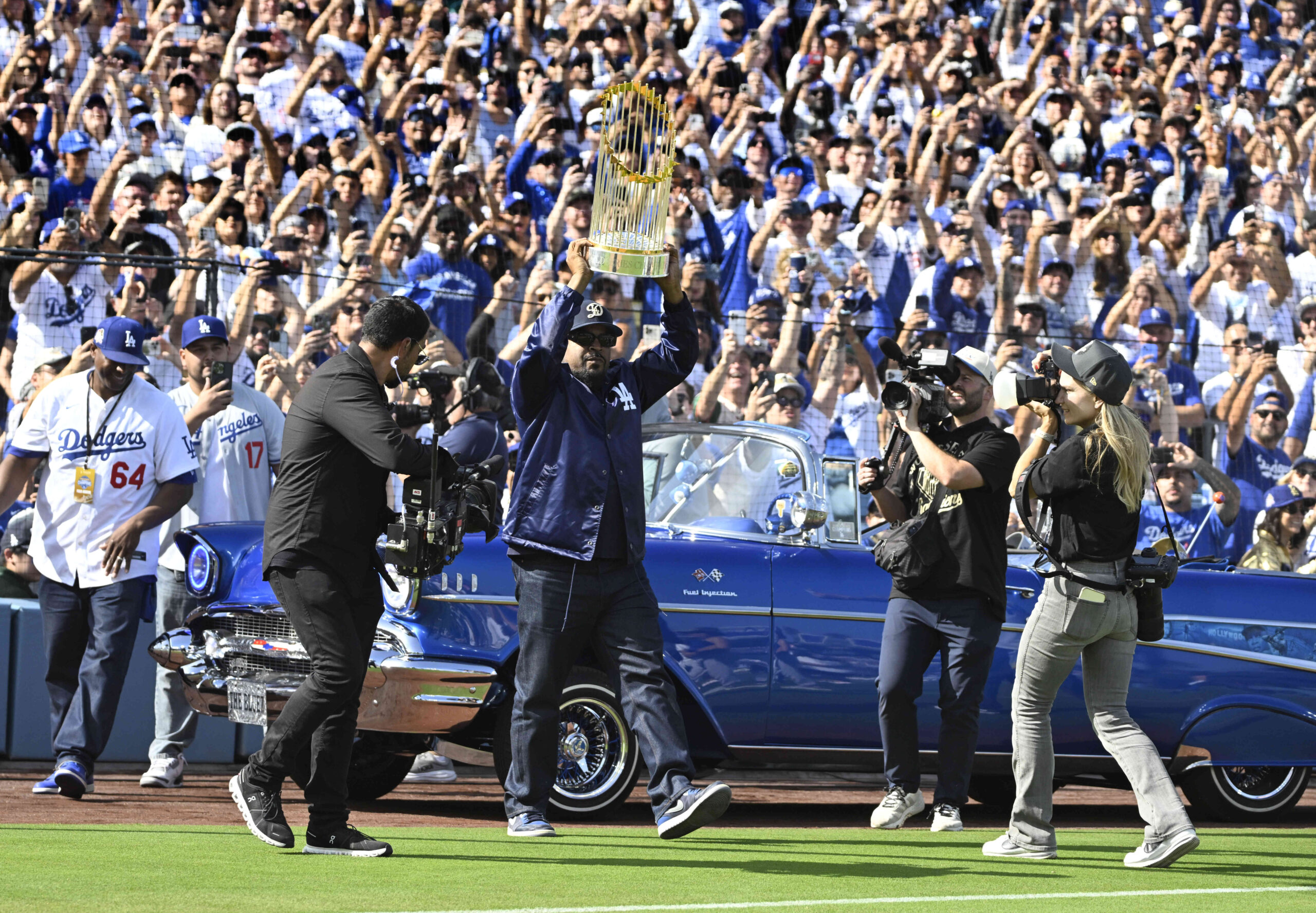 Ice Cube with the 2025 Commisioners Trophy during a celebration...