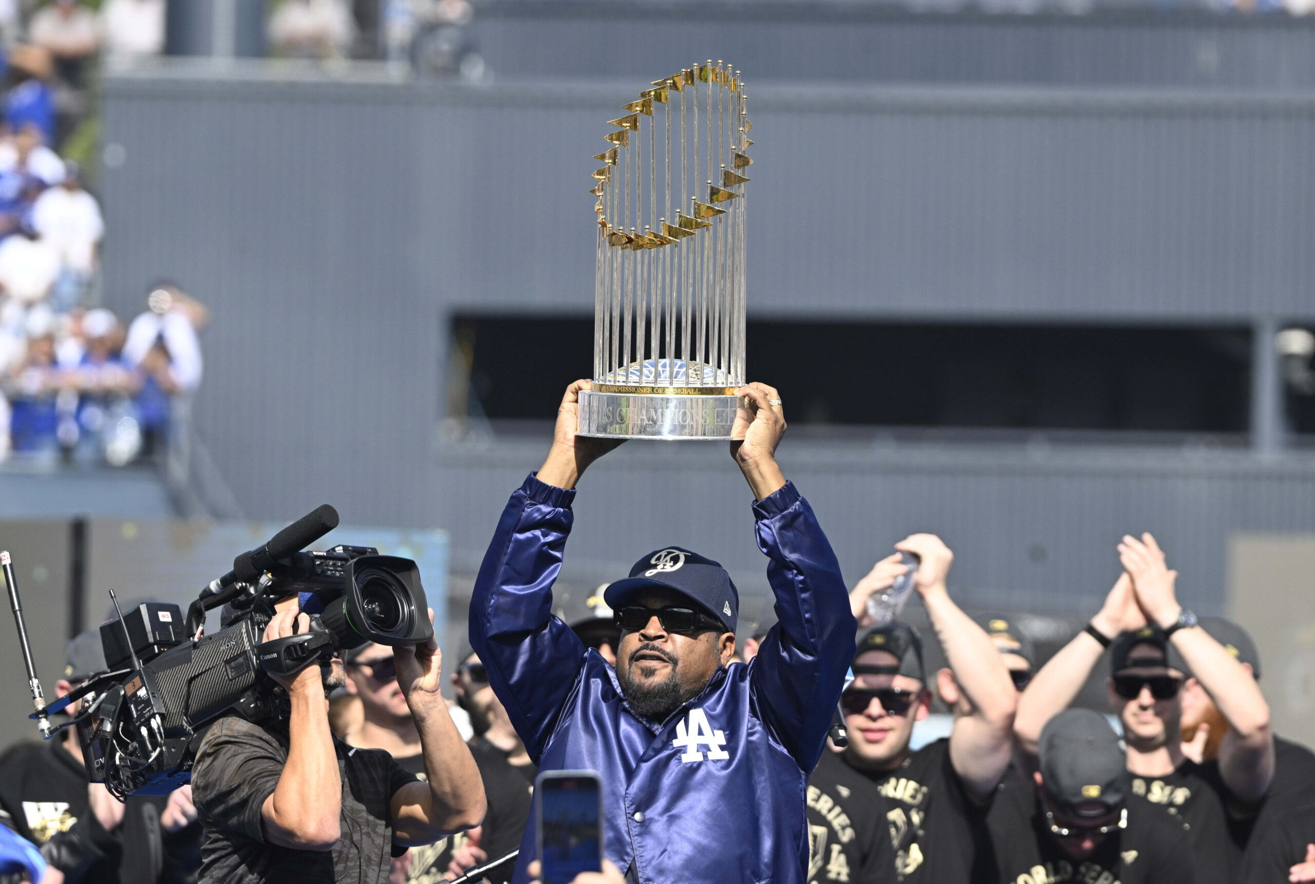 Ice Cube with the 2025 Commisioners Trophy during a celebration...