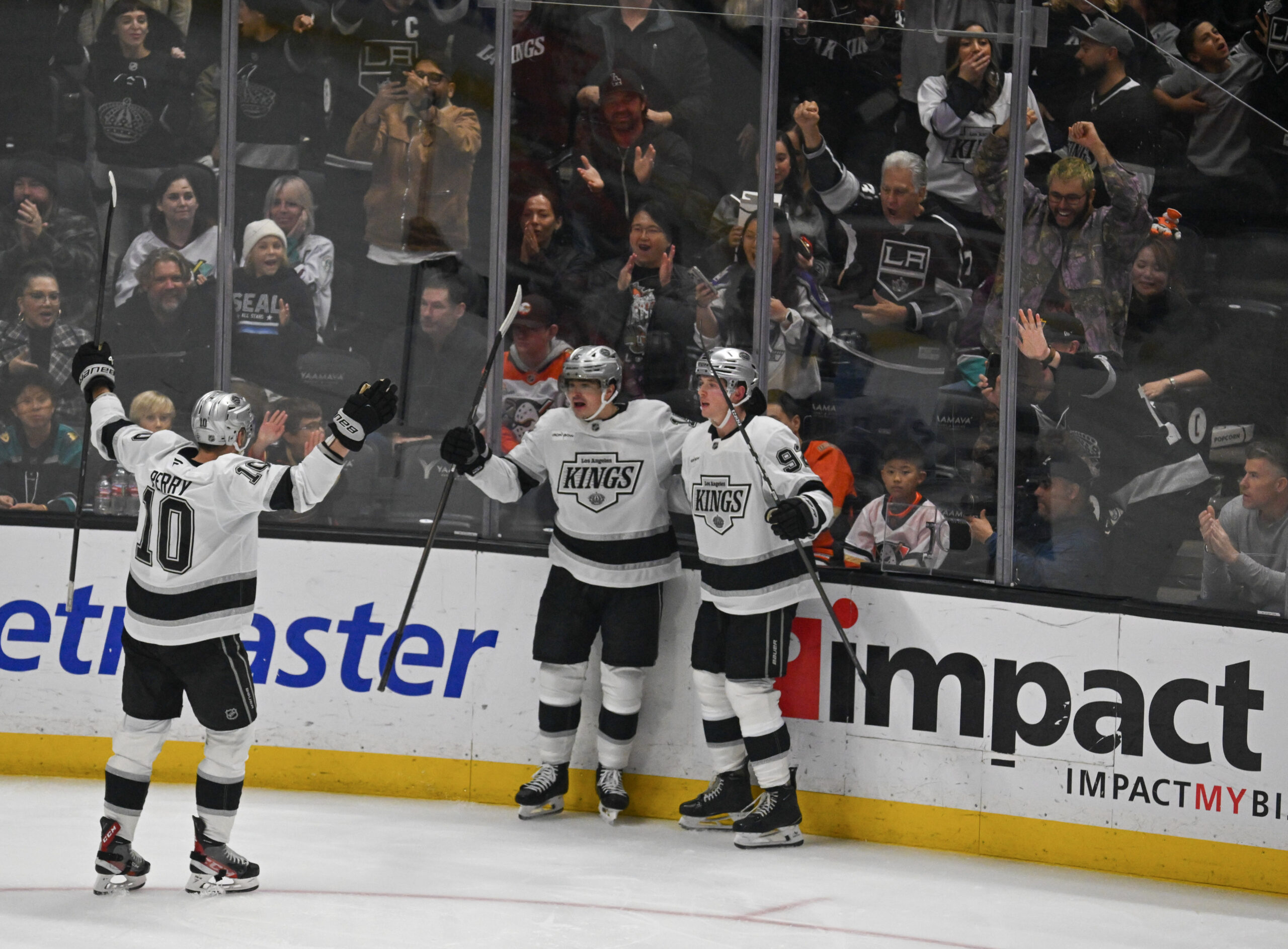 Kings players celebrate a goal during their game against the...