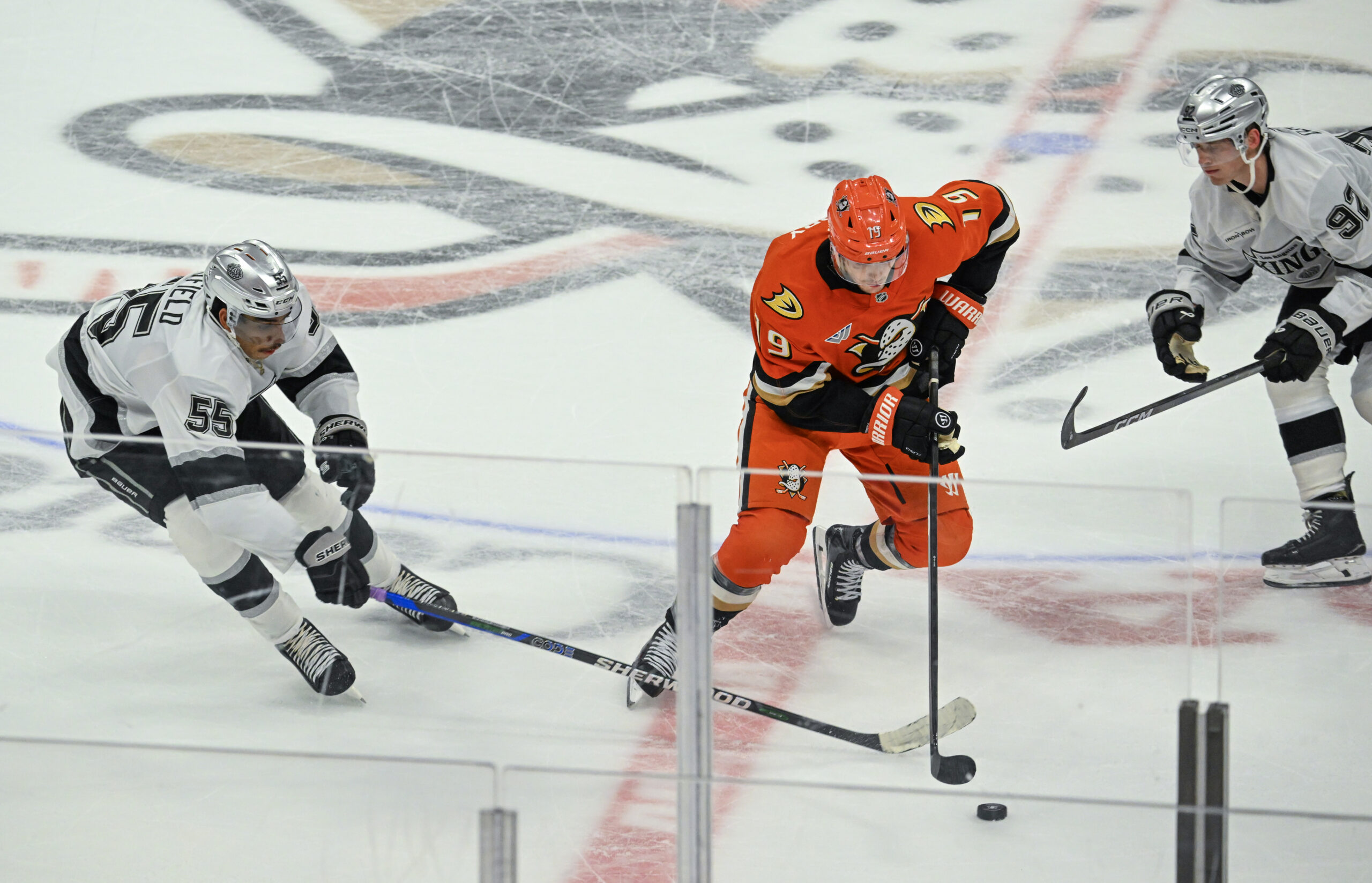 The Kings’ Quinton Byfield, left, and Brandt Clarke, right, defend...