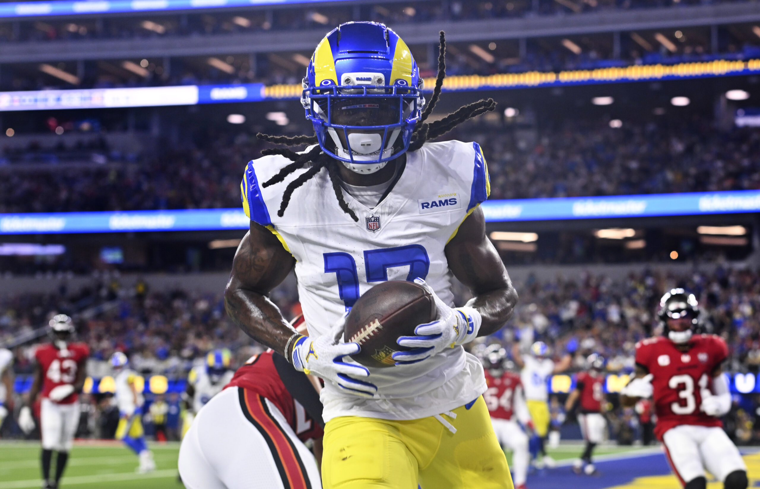 Wide receiver Davante Adams (17) of the Rams catches a...