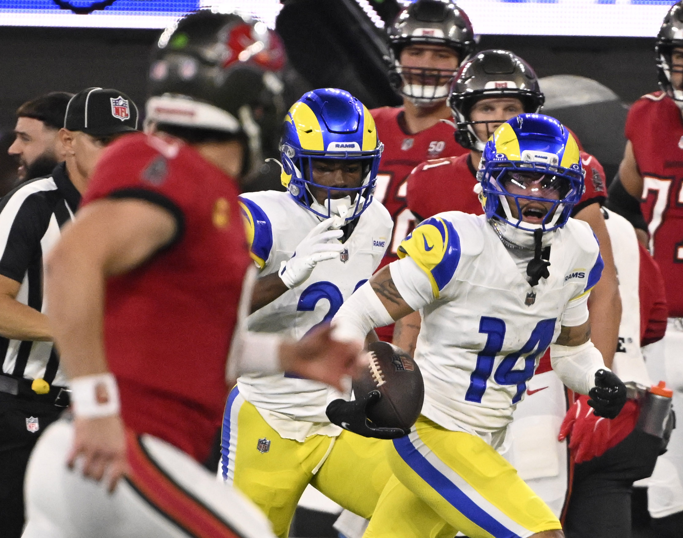 Cornerback Cobie Durant (14) of the Rams runs for the...