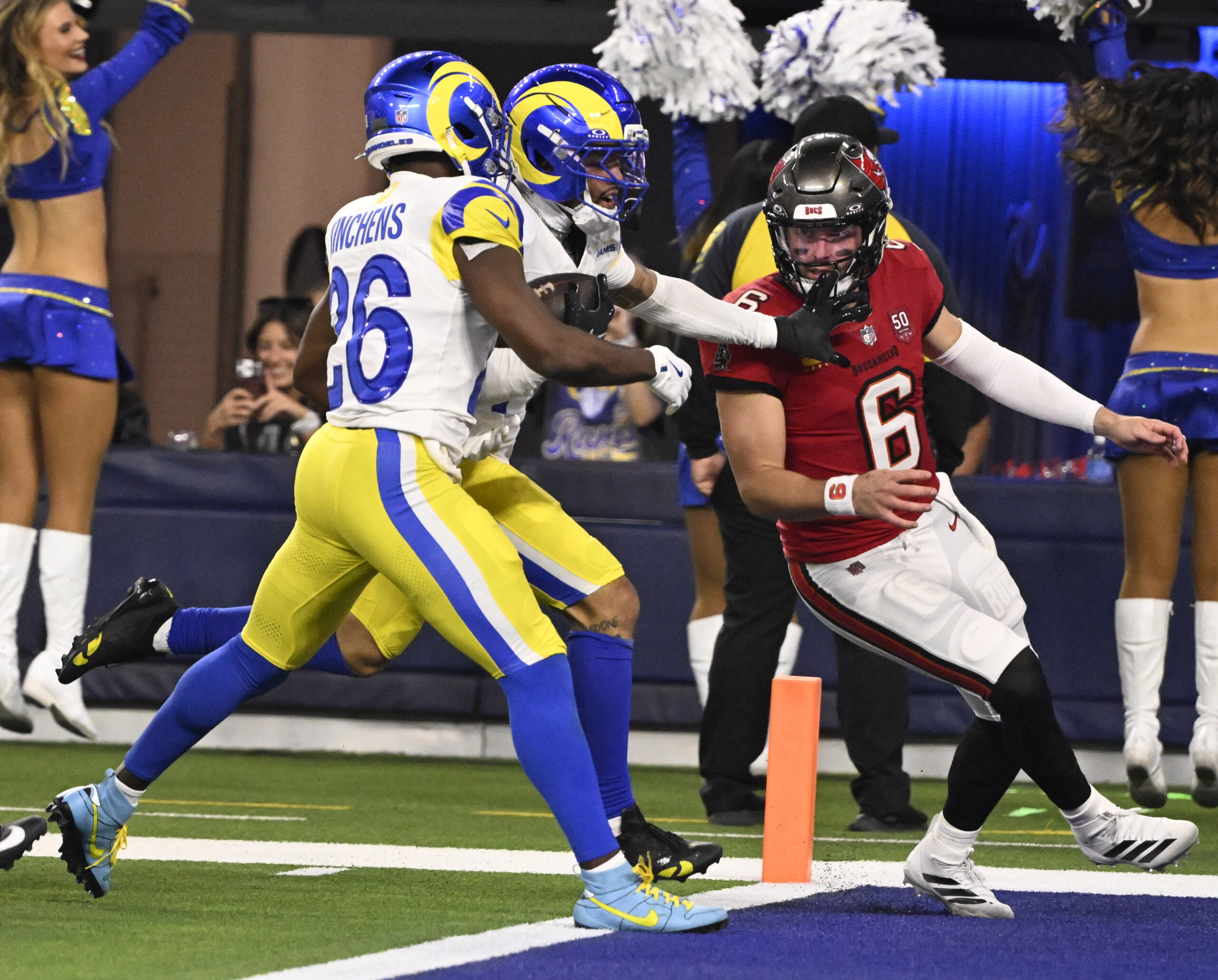 Cornerback Cobie Durant (14) of the Rams runs for the...