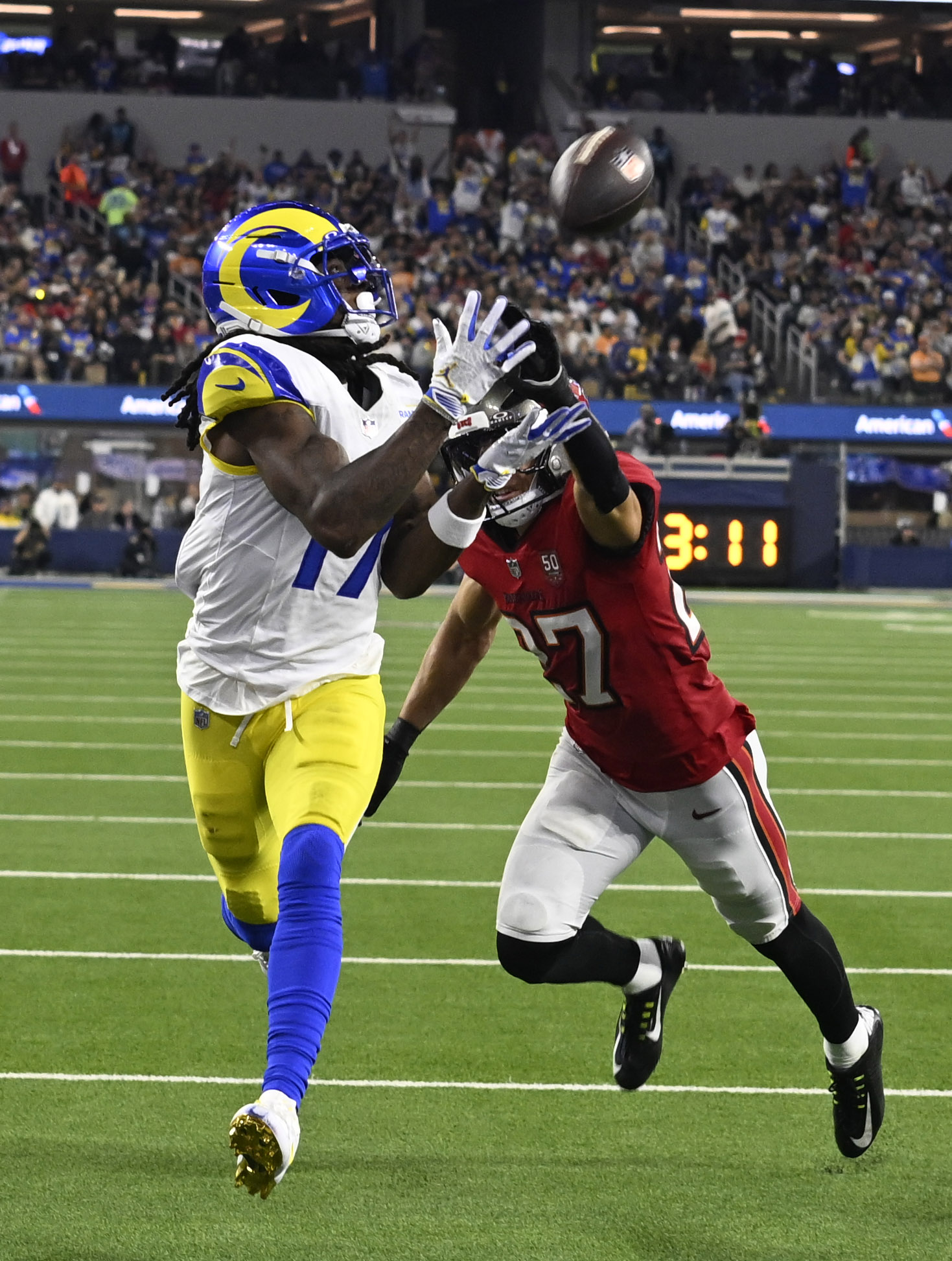 Wide receiver Davante Adams (17) of the Rams catches a...