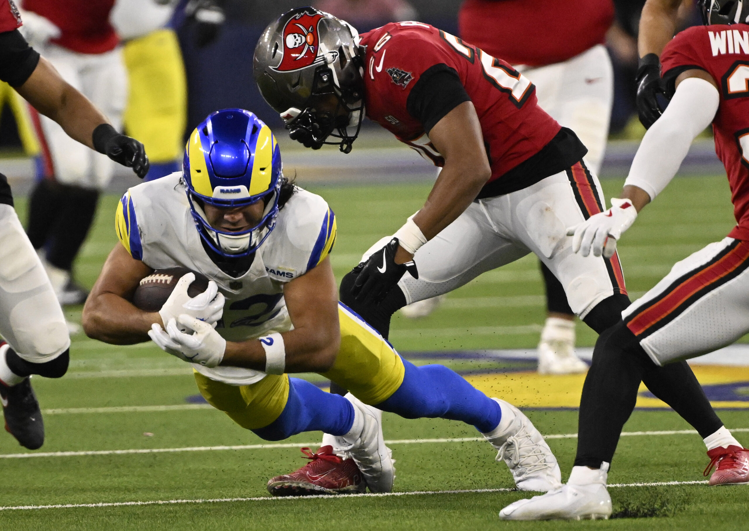 Wide receiver Puka Nacua (12) of the Rams catches a...