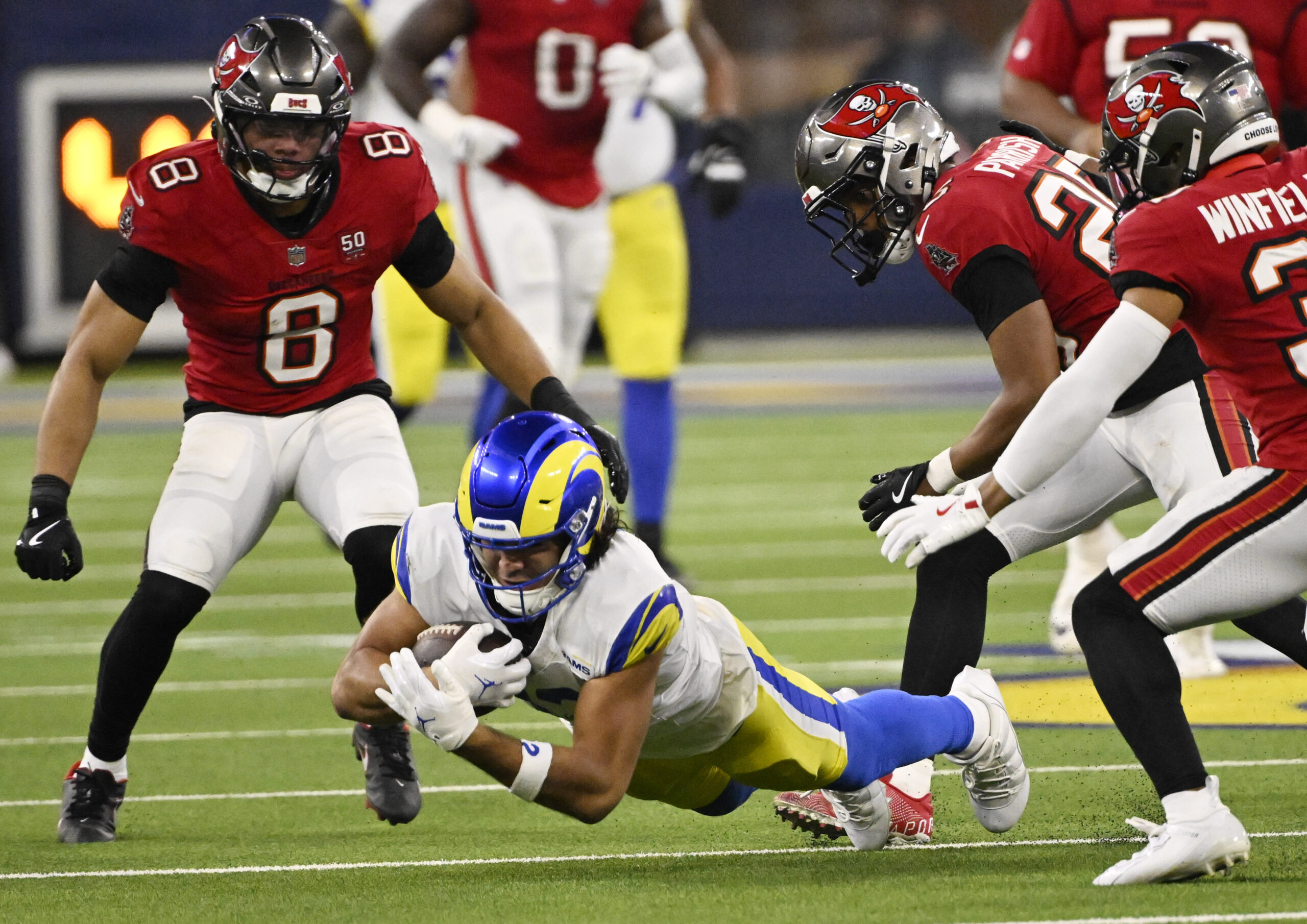 Wide receiver Puka Nacua (12) of the Rams catches a...