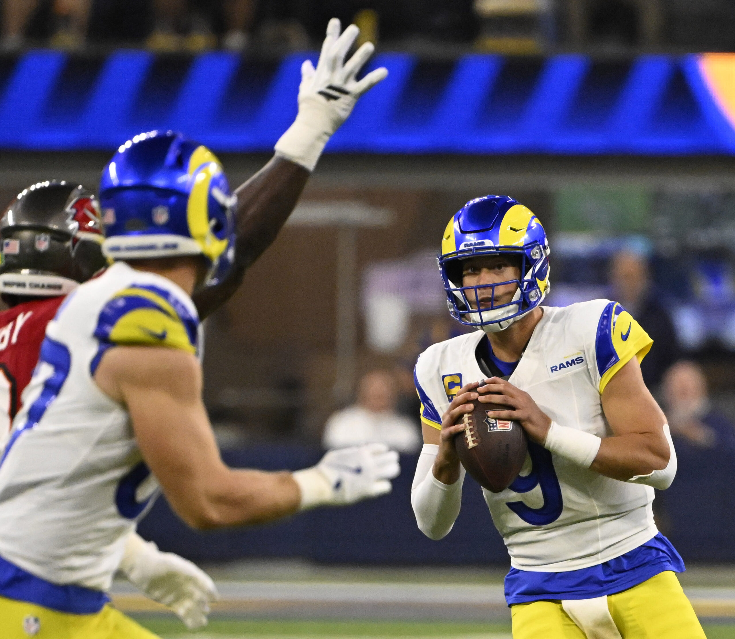 Quarterback Matthew Stafford (9) of the Rams prepares to pass...
