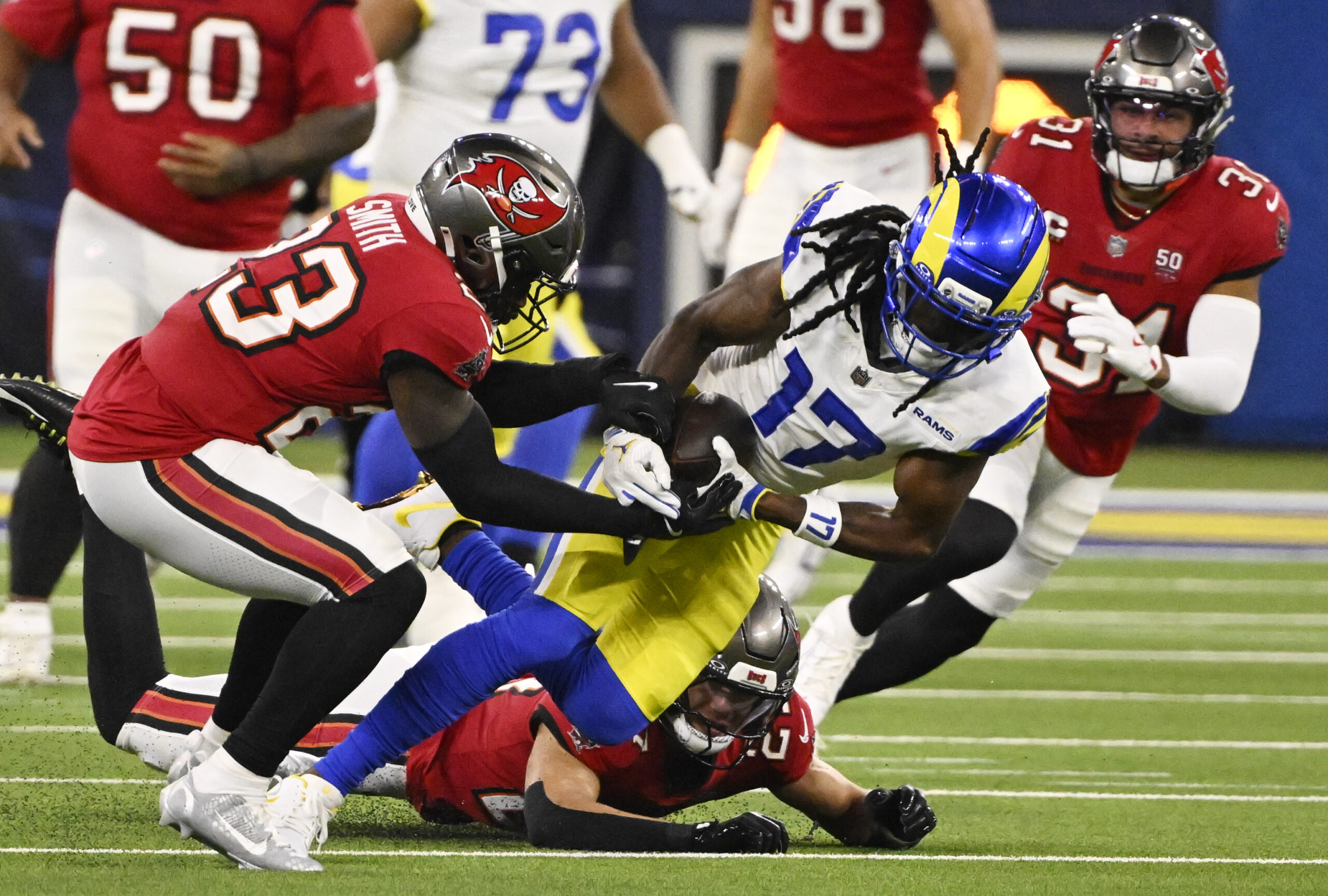 Wide receiver Davante Adams (17) of the Rams catches a...