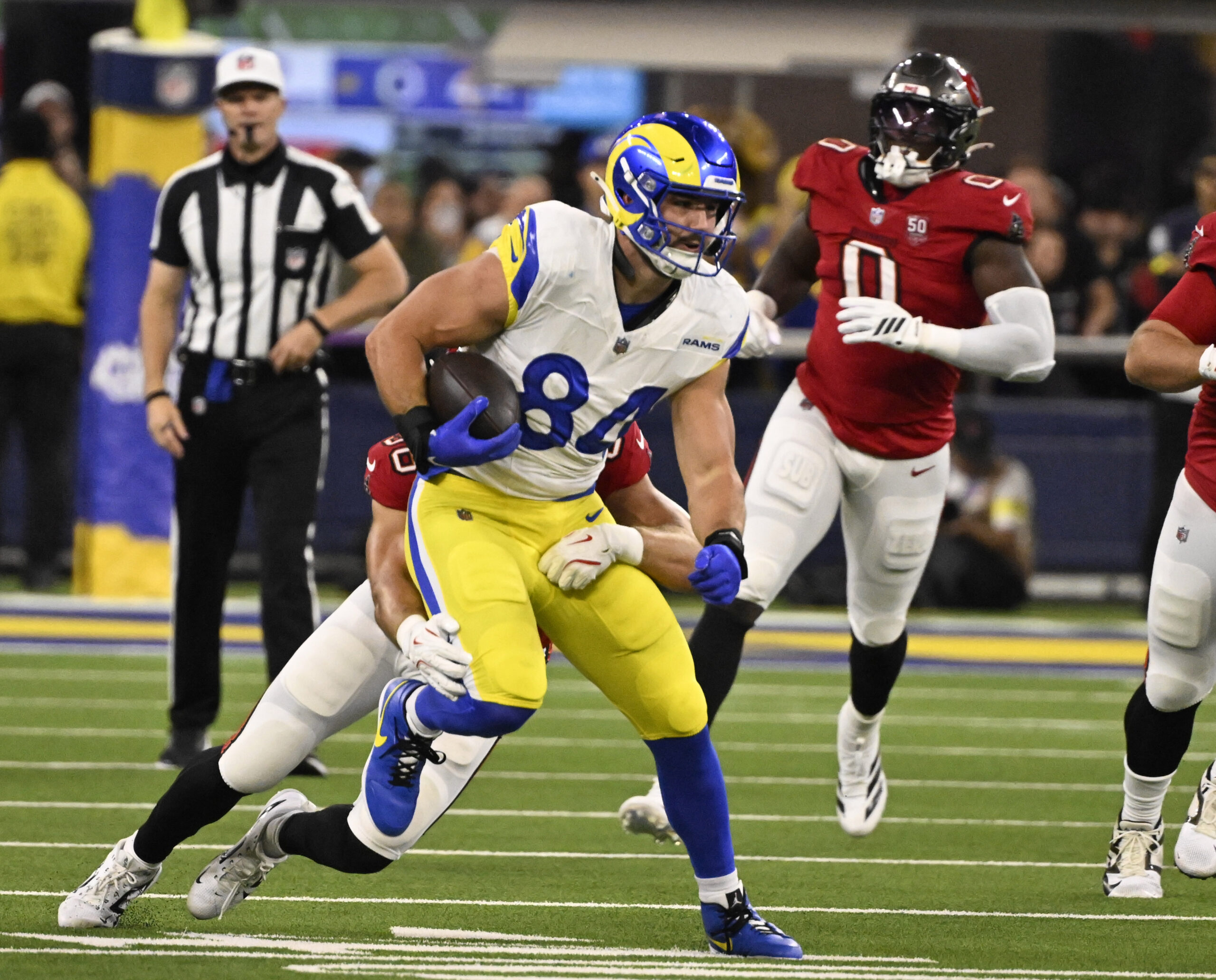 Tight end Colby Parkinson (84) of the Rams catches a...