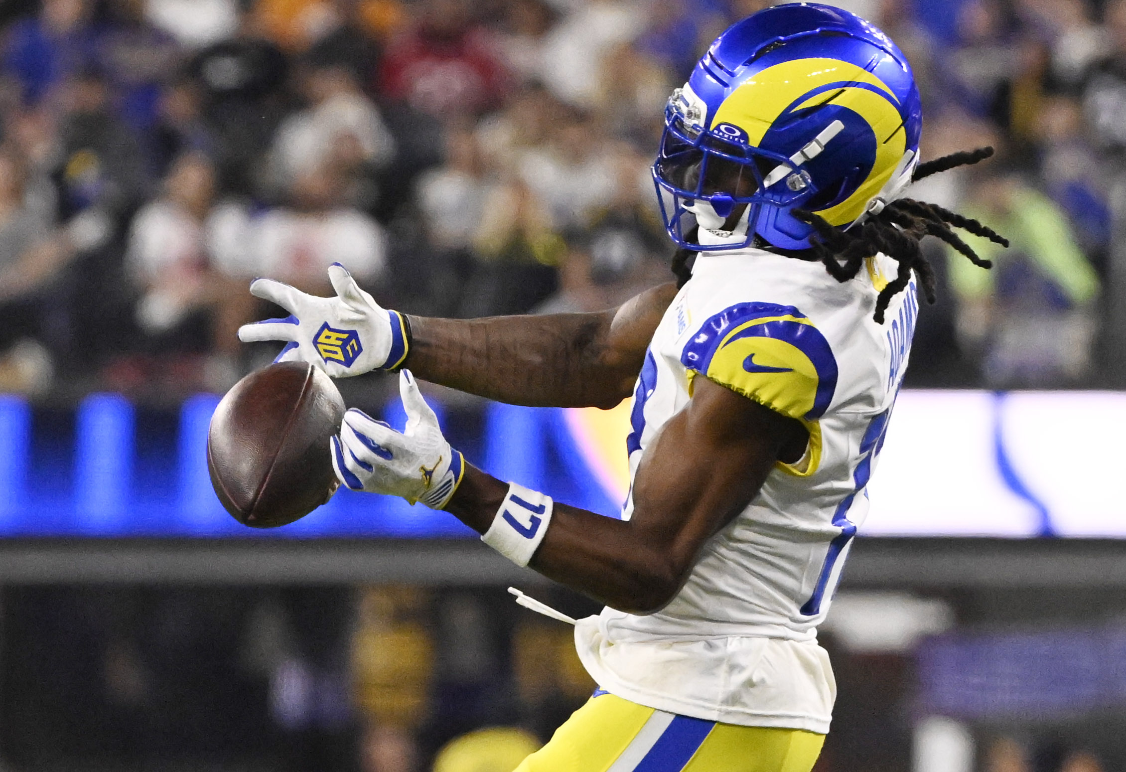 Wide receiver Davante Adams (17) of the Rams drops a...