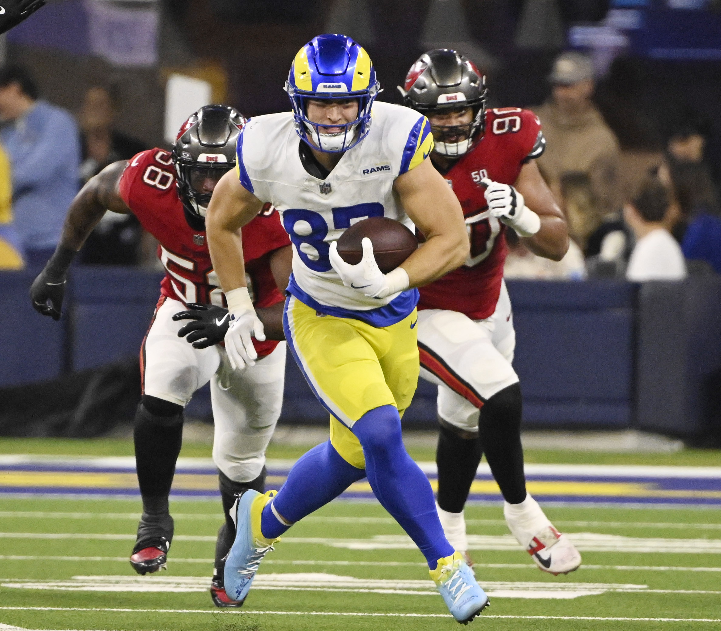 Tight end Davis Allen (87) of the Rams catches a...