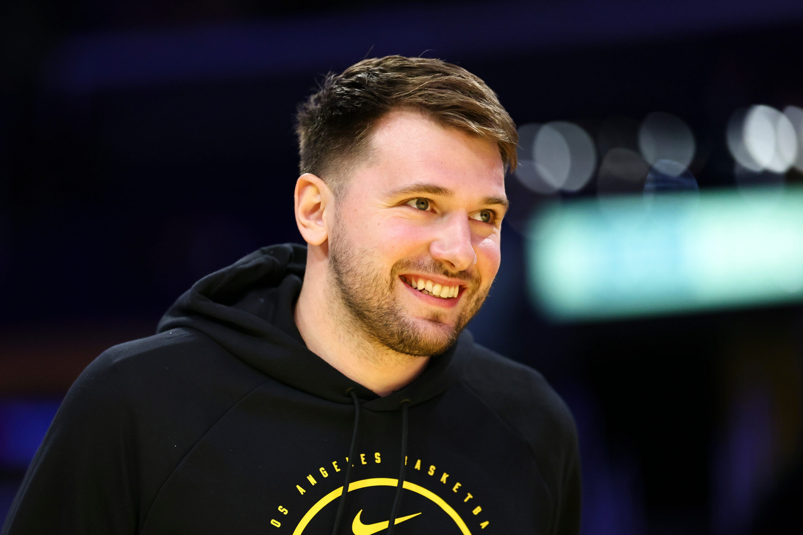 Lakers guard Luka Doncic reacts before an NBA basketball game...