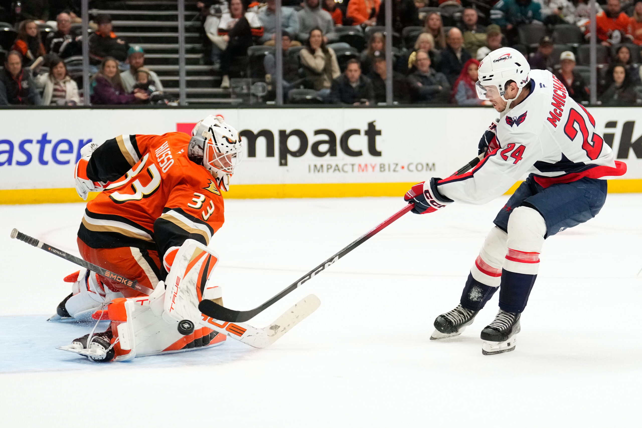 Ducks goaltender Ville Husso stops a shot by Washington Capitals...