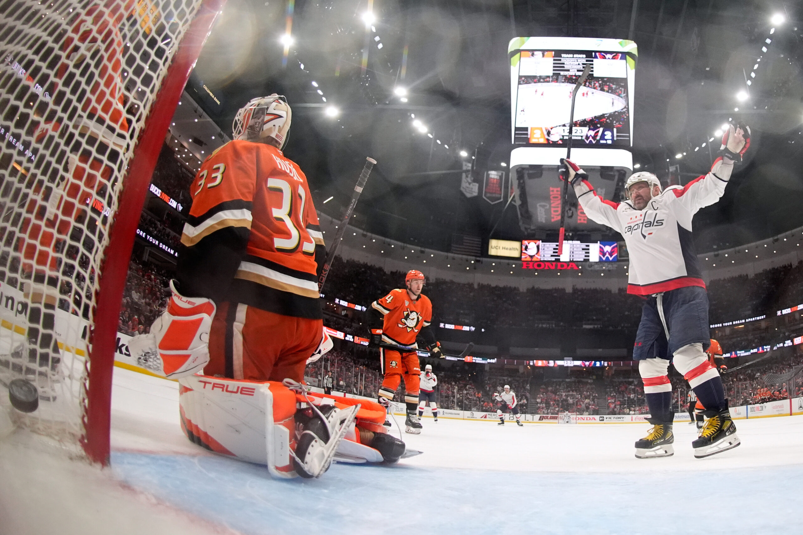 Washington Capitals left wing Alex Ovechkin, right, celebrates a goal...