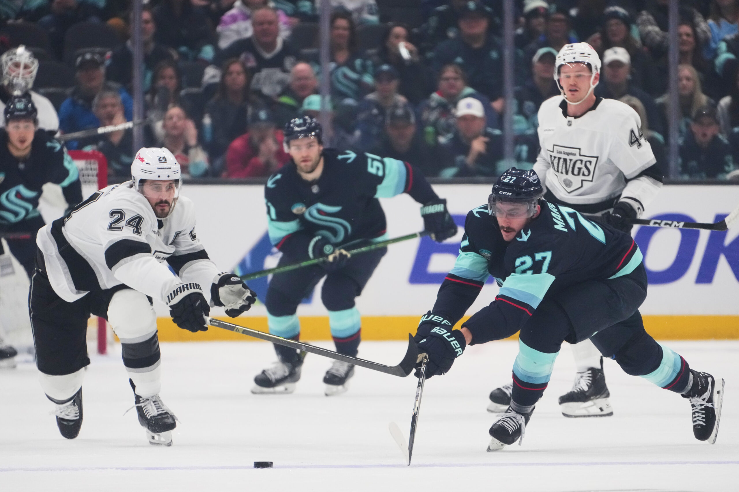 Kings center Phillip Danault (24) and Seattle Kraken left wing...