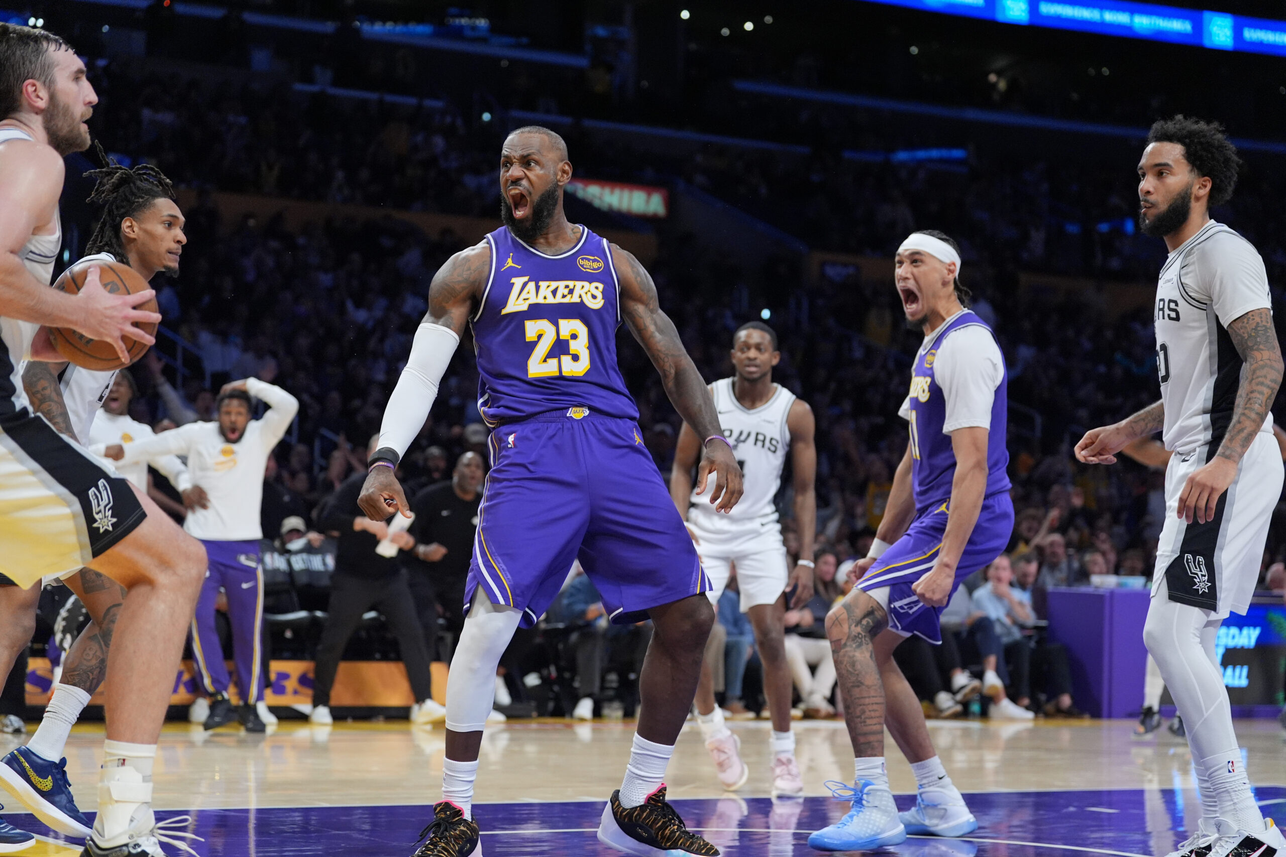 Lakers forward Lebron James (23) and center Jaxson Hayes (11)...