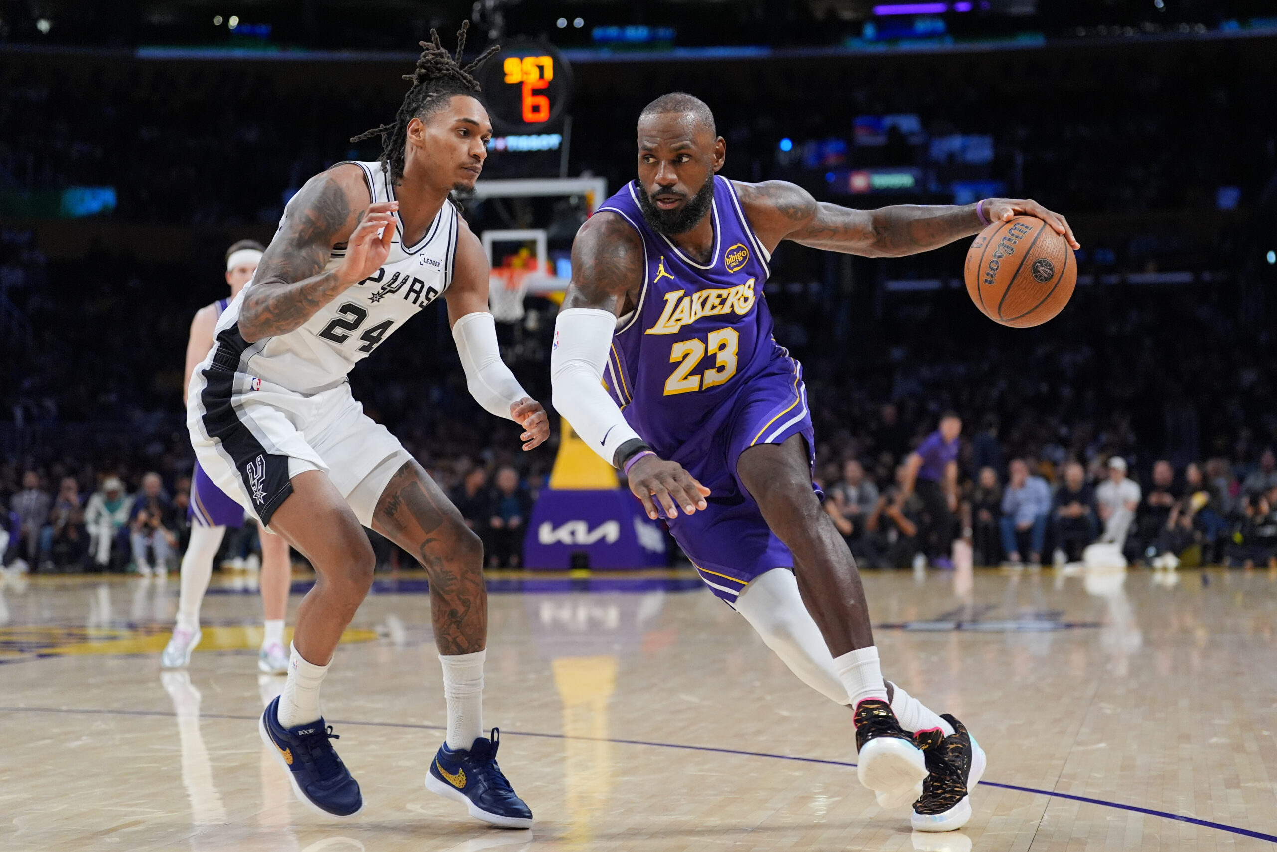 Lakers forward Lebron James drives as San Antonio Spurs guard...