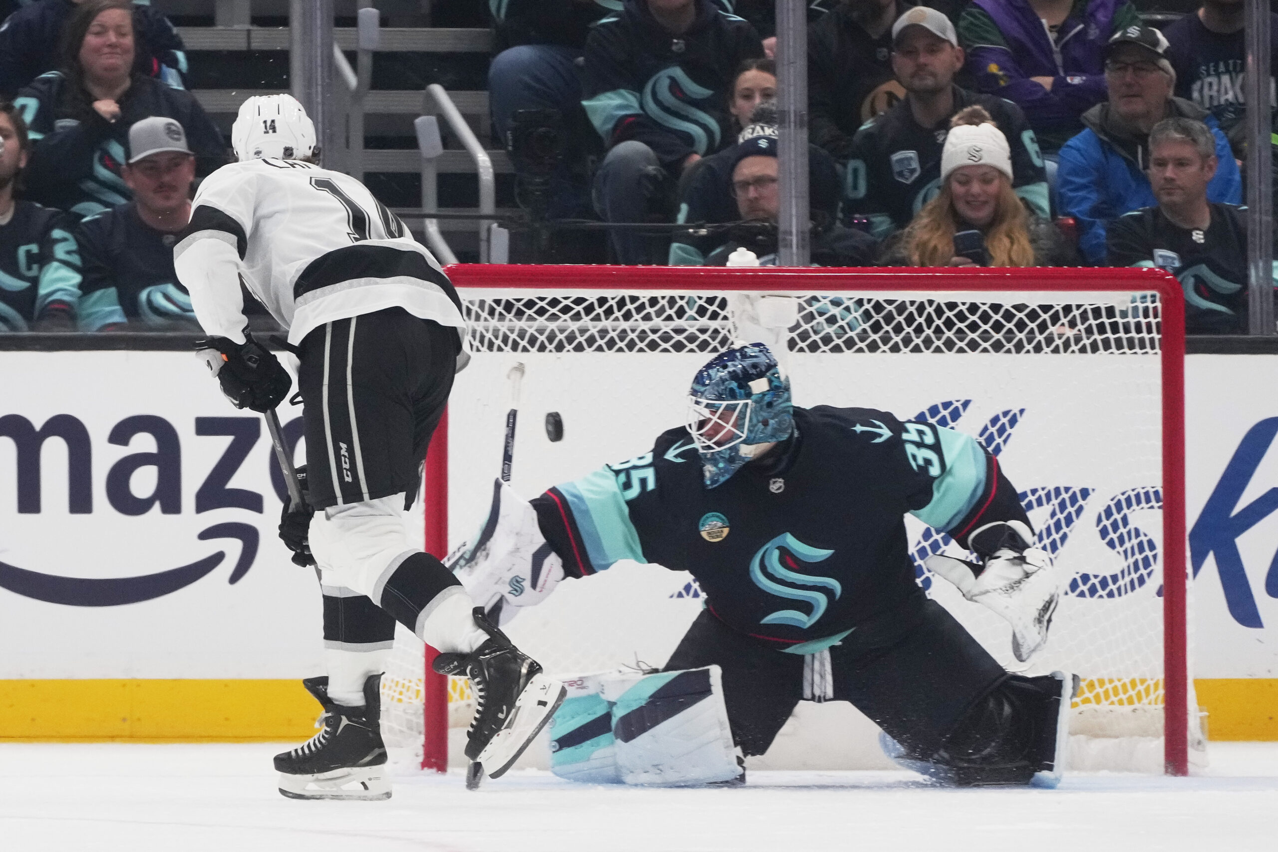 Kings right wing Alex Laferriere scores against Seattle Kraken goaltender...