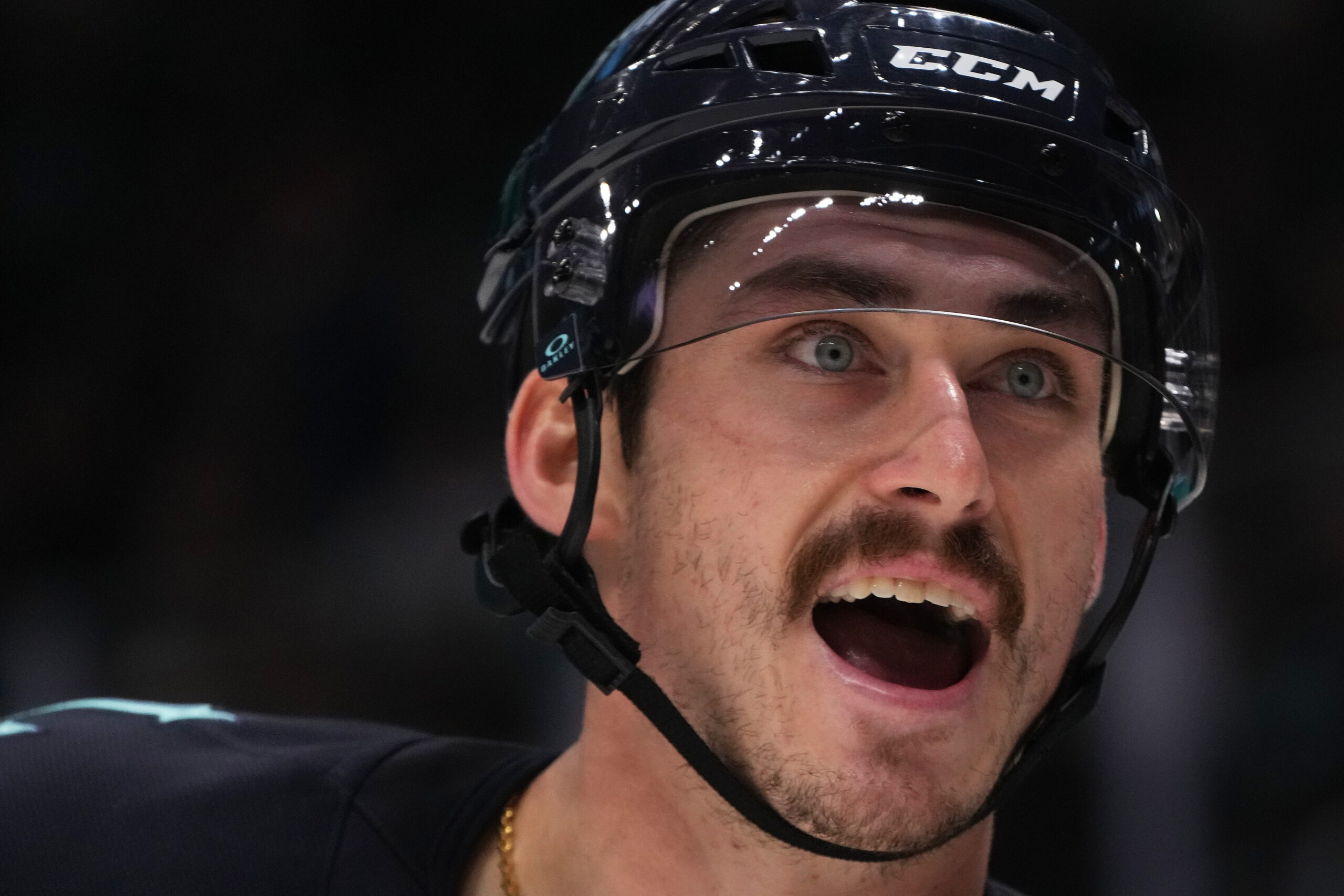 Seattle Kraken left wing Mason Marchment reacts after a missed...
