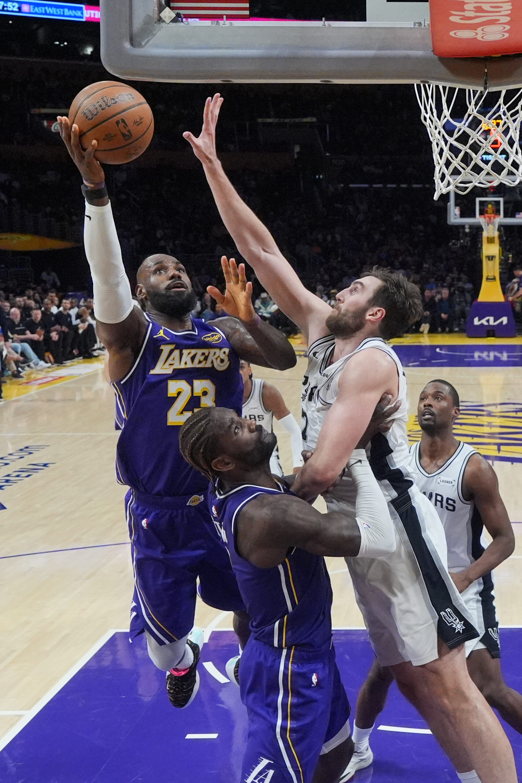 Lakers forward Lebron James (23) goes up for a shot...
