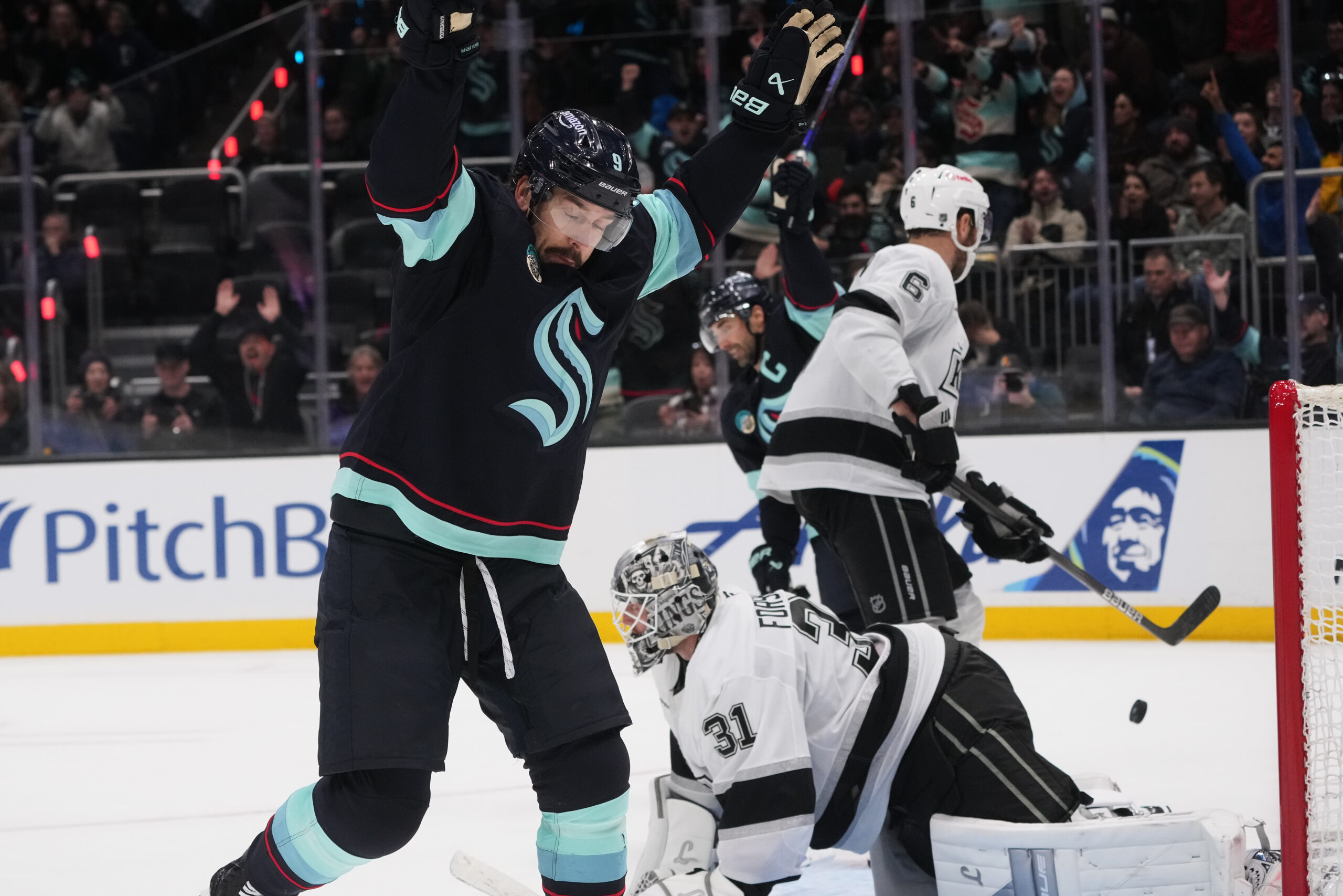 Seattle Kraken center Chandler Stephenson reacts to the game-winning goal...