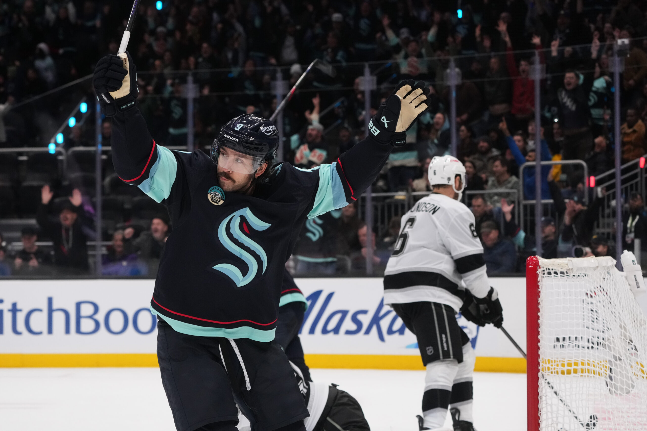 Seattle Kraken center Chandler Stephenson reacts to the game-winning goal...