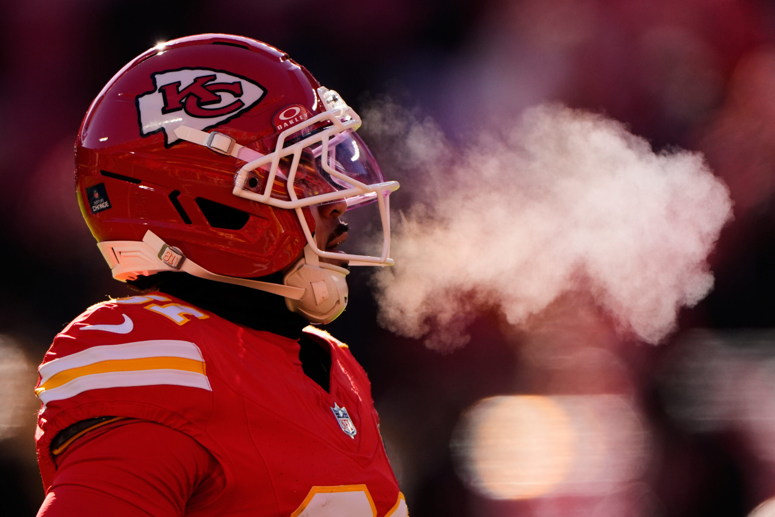 Kansas City Chiefs wide receiver Nikko Remigio warms up before...